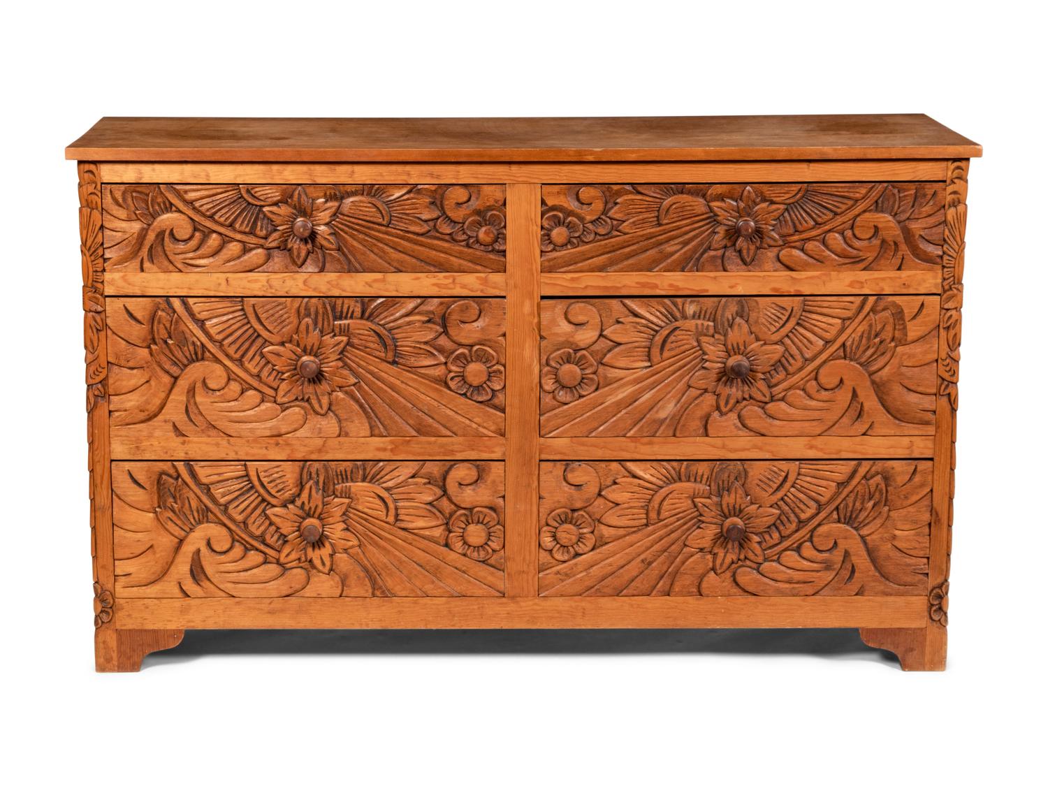 A Carved Central American Chest of Drawers