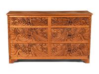 A Carved Central American Chest of Drawers