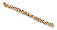A Yellow Gold, Platinum and Diamond Bracelet, 42.90 dwts.