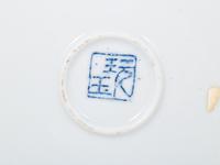 A Set of Eight "Pronk Dame au Parasol" Porcelain Chargers