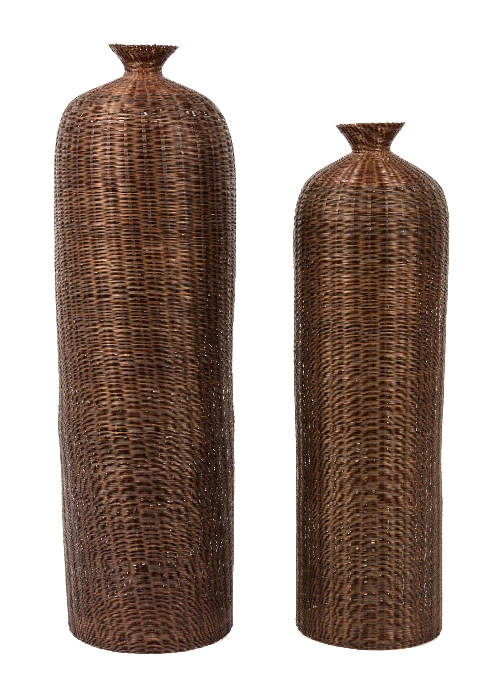 A Pair of Japanese Woven Fishing Baskets Height of taller 48 inches. — 20TH CENTURY