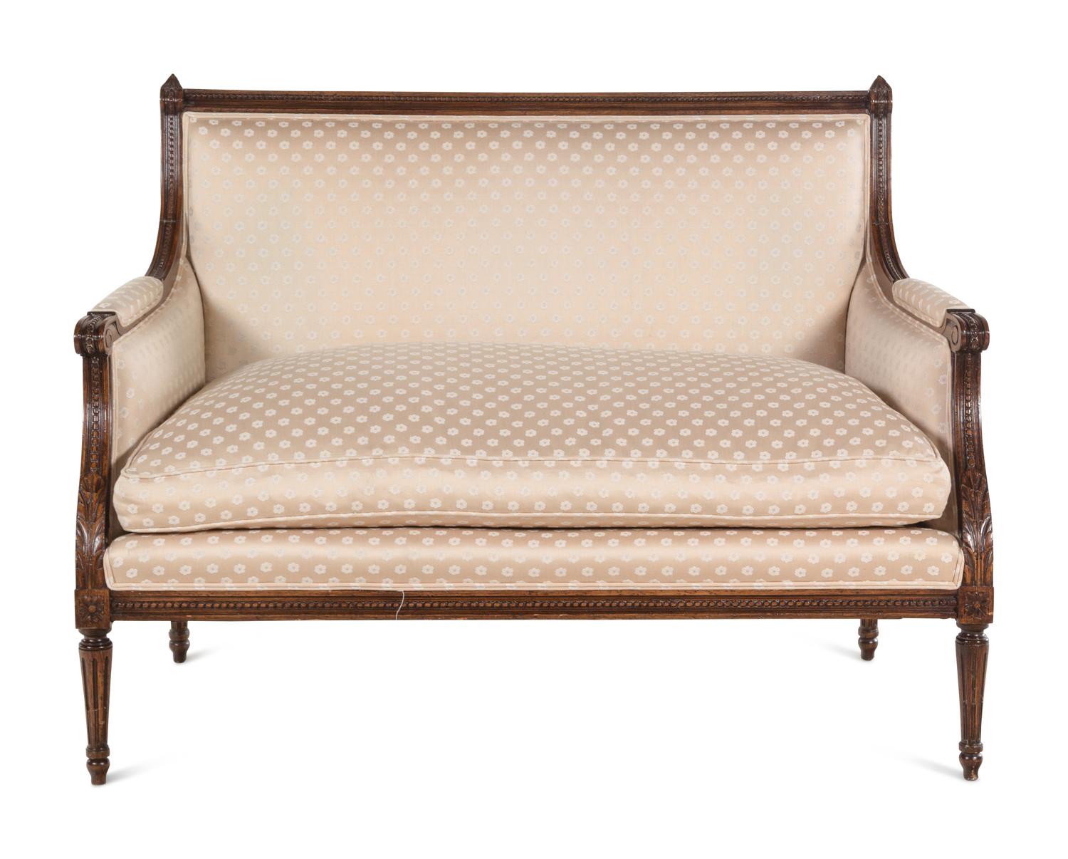 A Louis XVI Style Walnut Settee