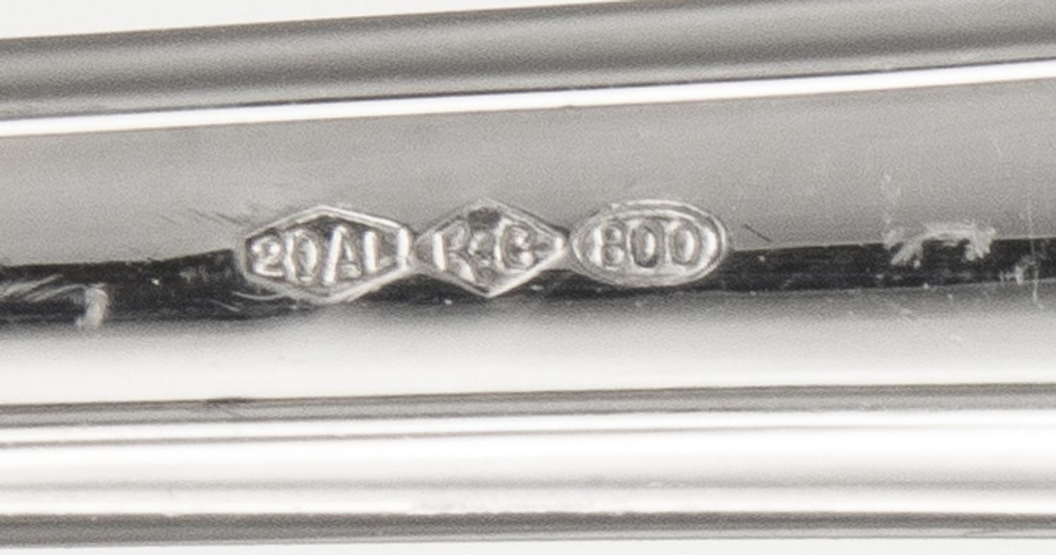 An Italian Silver Flatware Service, Ricci & Co., Alessandria, Impero pattern, comprising: 12 dinner knives 12 dessert knives 12 dinner