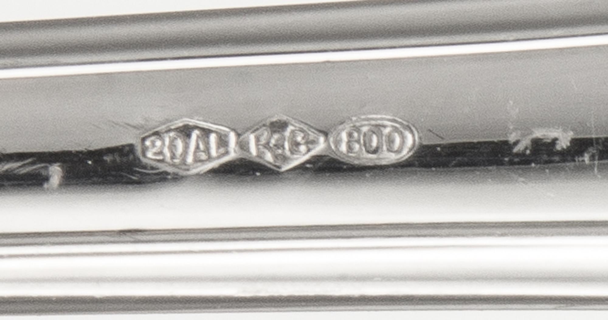 An Italian Silver Flatware Service, Ricci & Co., Alessandria, Impero pattern, comprising: 12 dinner knives 12 dessert knives 12 dinner