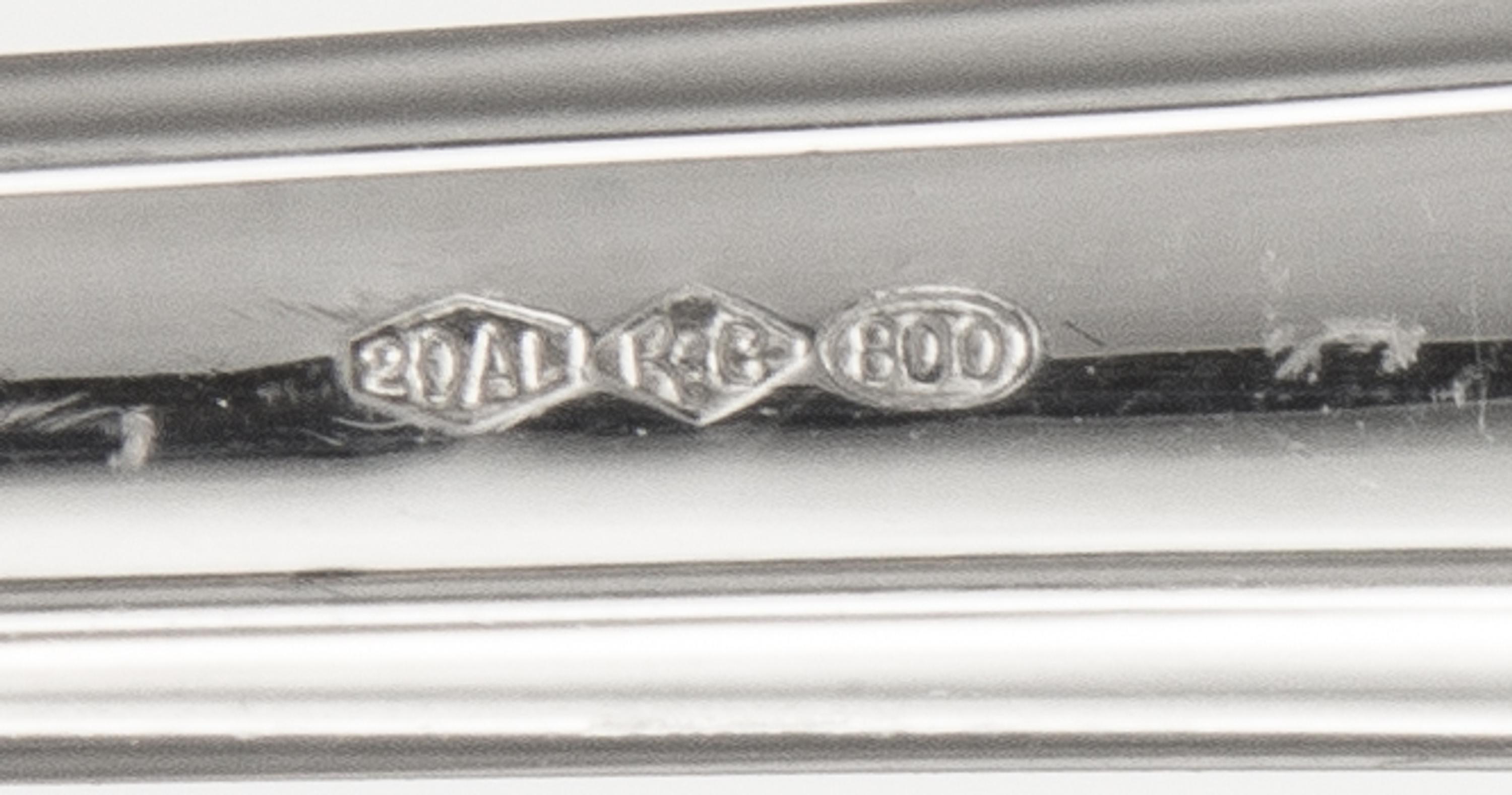 An Italian Silver Flatware Service, Ricci & Co., Alessandria, Impero pattern, comprising: 12 dinner knives 12 dessert knives 12 dinner