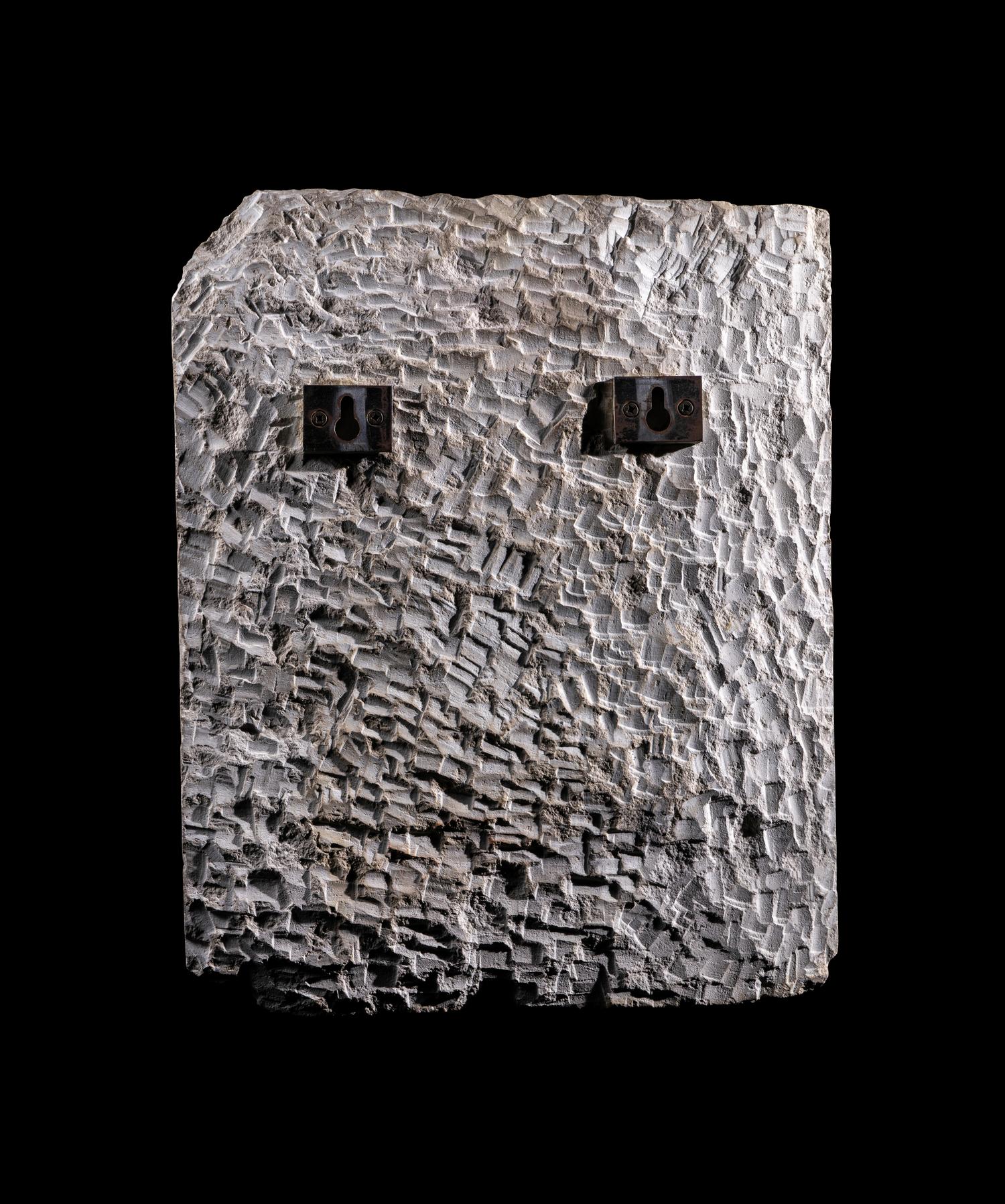 An Egyptian Limestone Relief of Khonsu