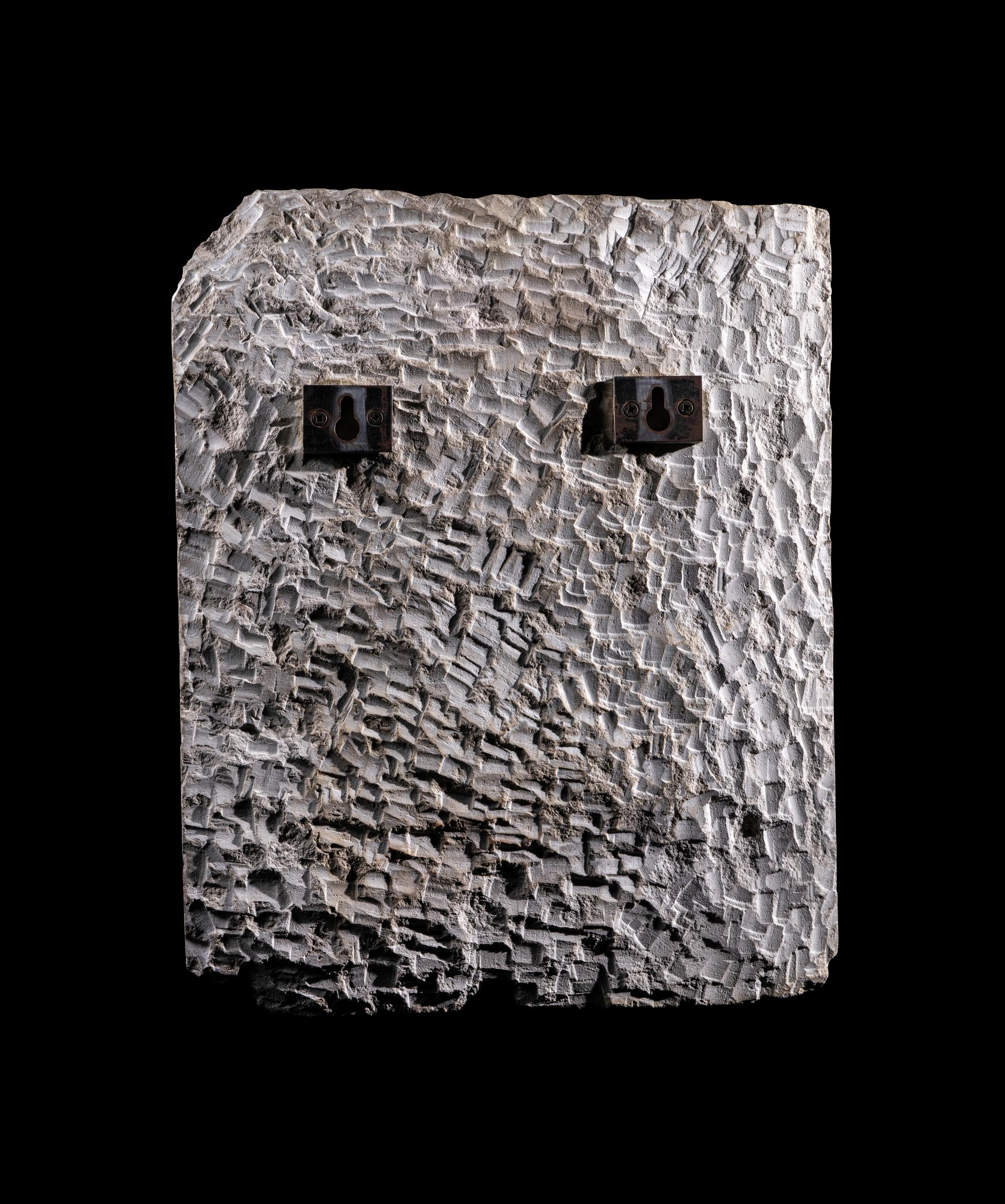 An Egyptian Limestone Relief of Khonsu