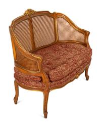 A Pair of Louis XV Style Stained and Giltwood Settees
