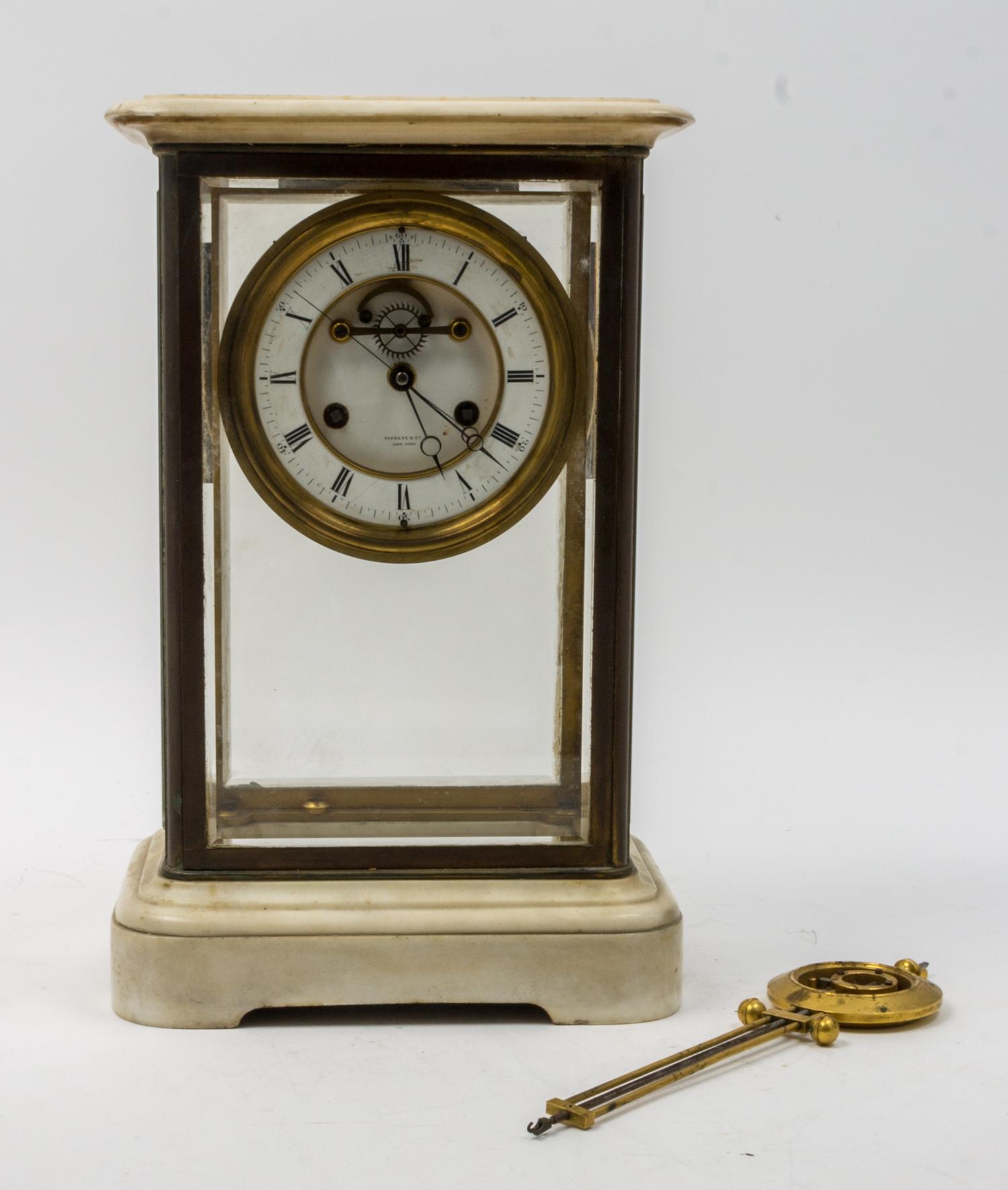 A French Brass and Marble Crystal Regulator Clock Height 16 1/2 inches. — 19TH CENTURY