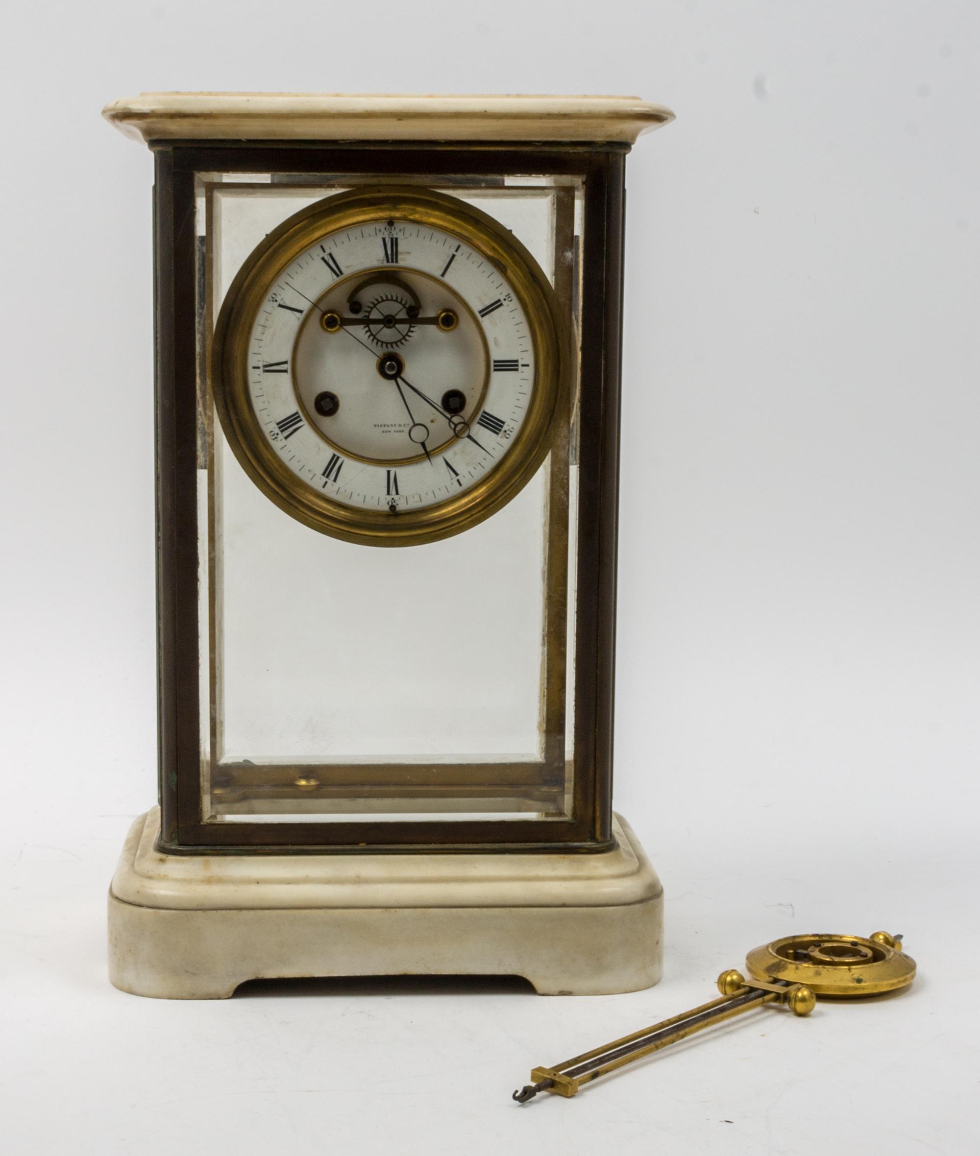 A French Brass and Marble Crystal Regulator Clock Height 16 1/2 inches. — 19TH CENTURY