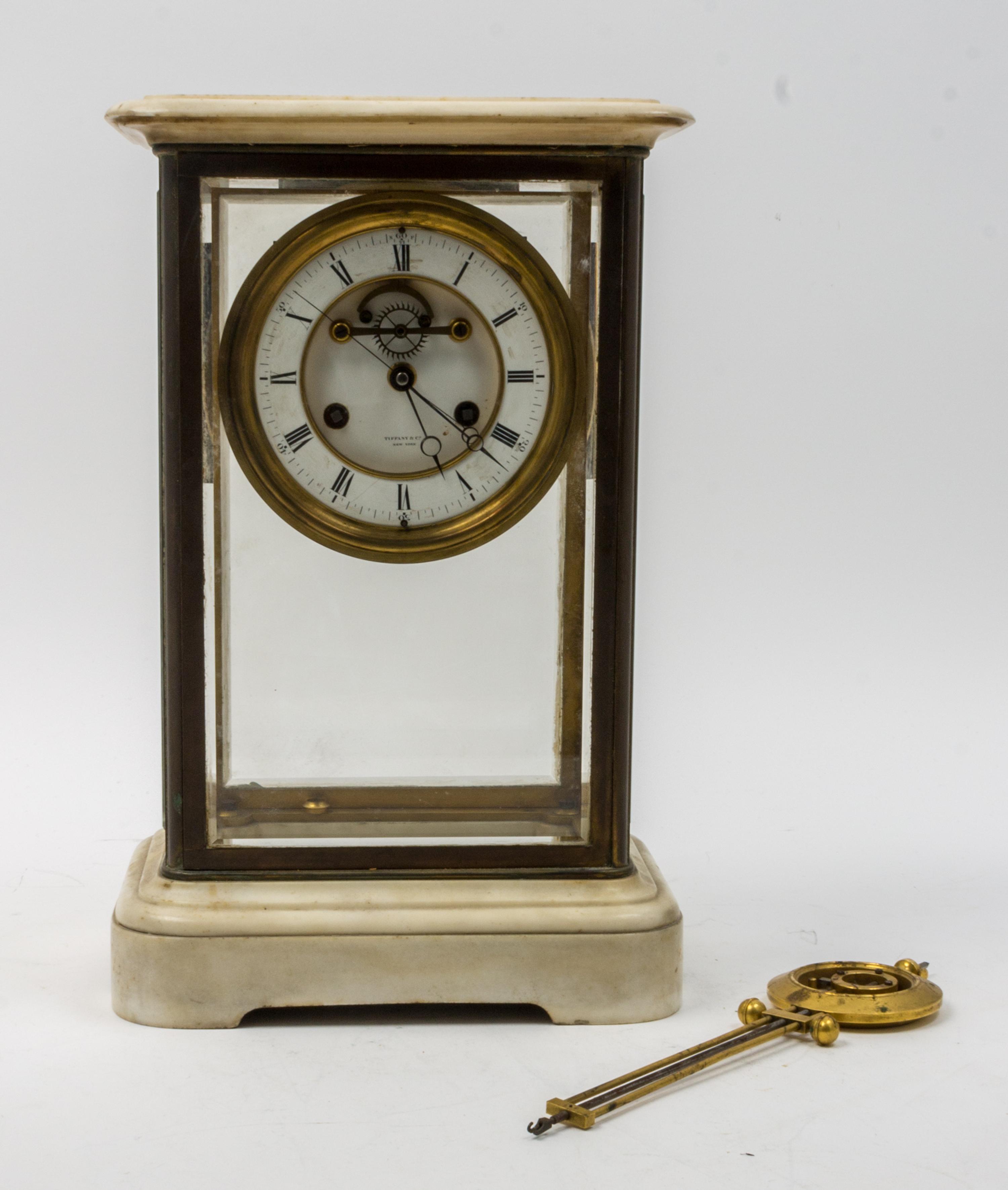 A French Brass and Marble Crystal Regulator Clock Height 16 1/2 inches. — 19TH CENTURY