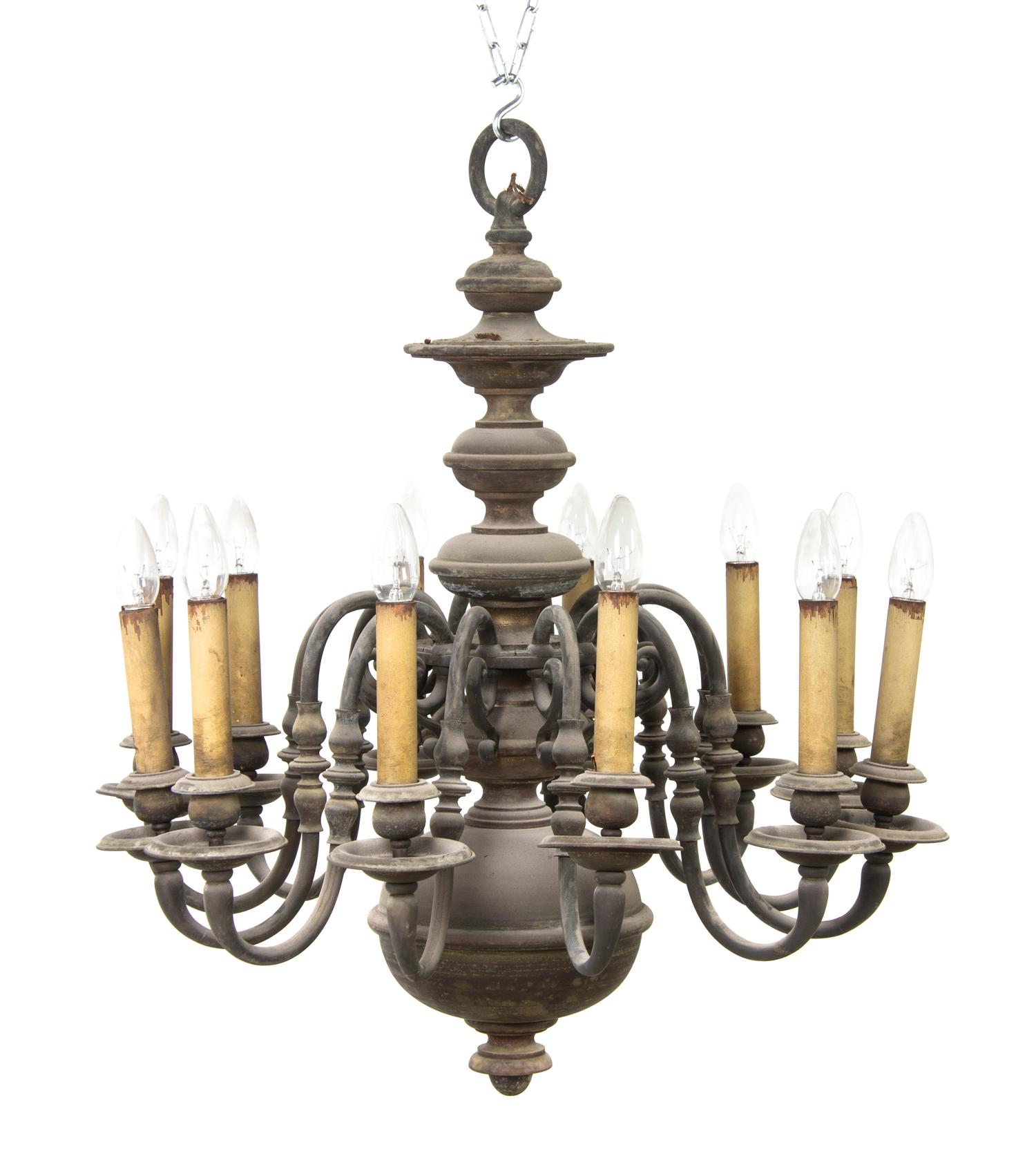 A Dutch Baroque Style Brass Twelve-Light Chandelier, Approximate height 37 x diameter 30 inches.