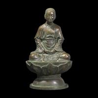 A Patinated Bronze Figure of a Seated Boddhisattva, Possibly Vietnamese 或爲越南 銅鎏金菩薩像