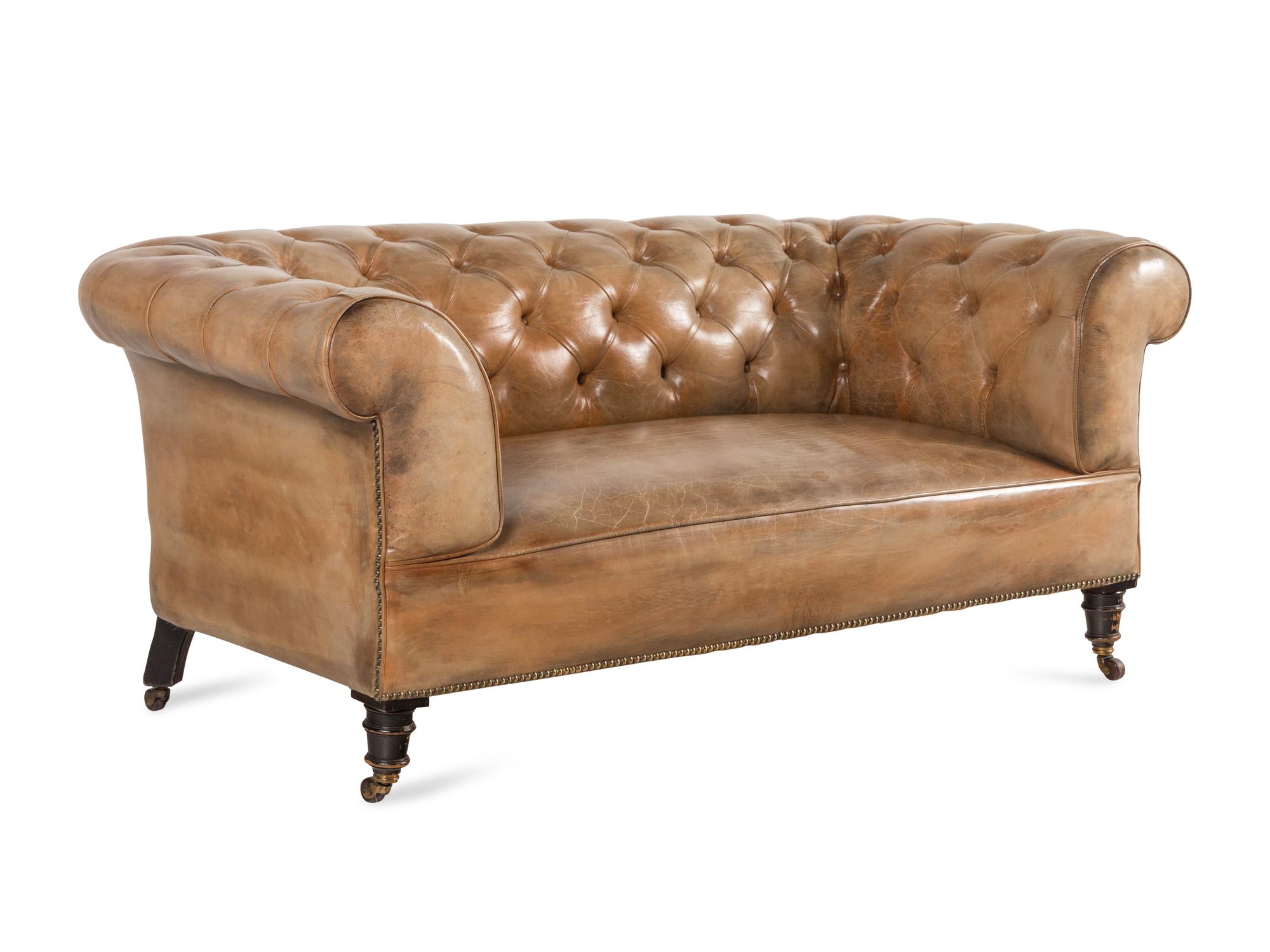 A Leather Upholstered Chesterfield Sofa