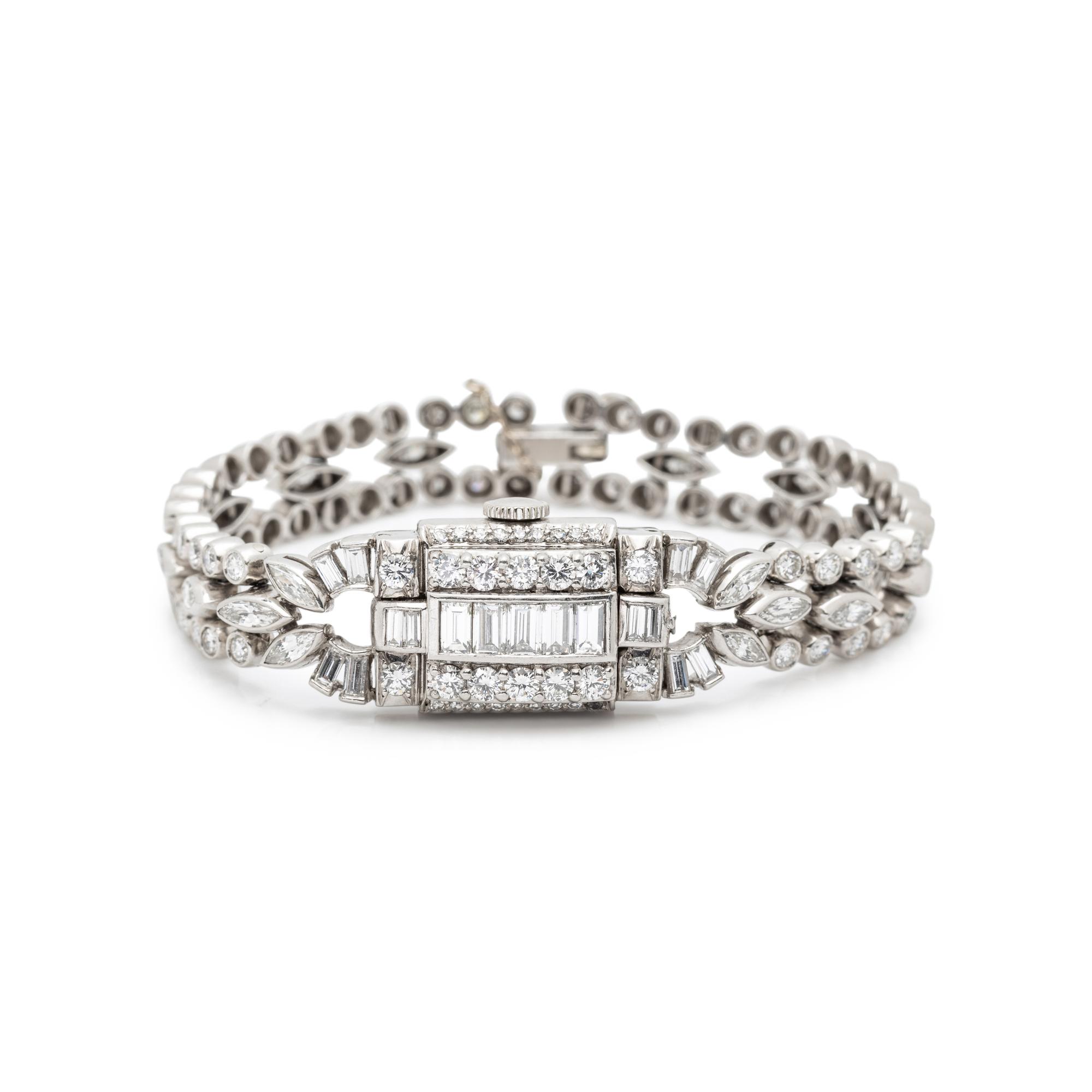 HAMILTON, PLATINUM AND DIAMOND SURPRISE WATCH