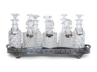 A Large Sheffield Silver-Plate Galleried Tray and Eleven Cut Glass Decanters