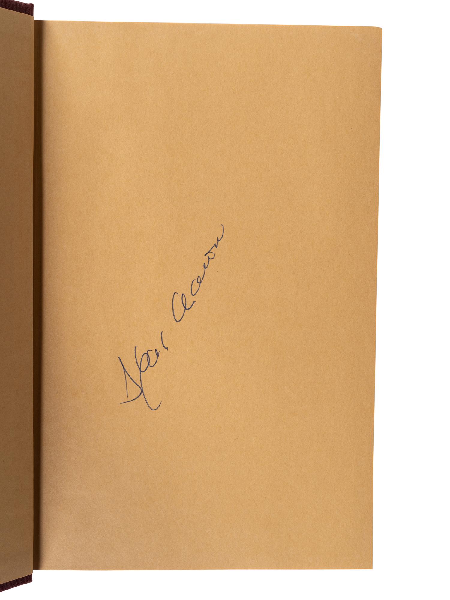 A Group of Two Hank Aaron Signed Autograph Books,