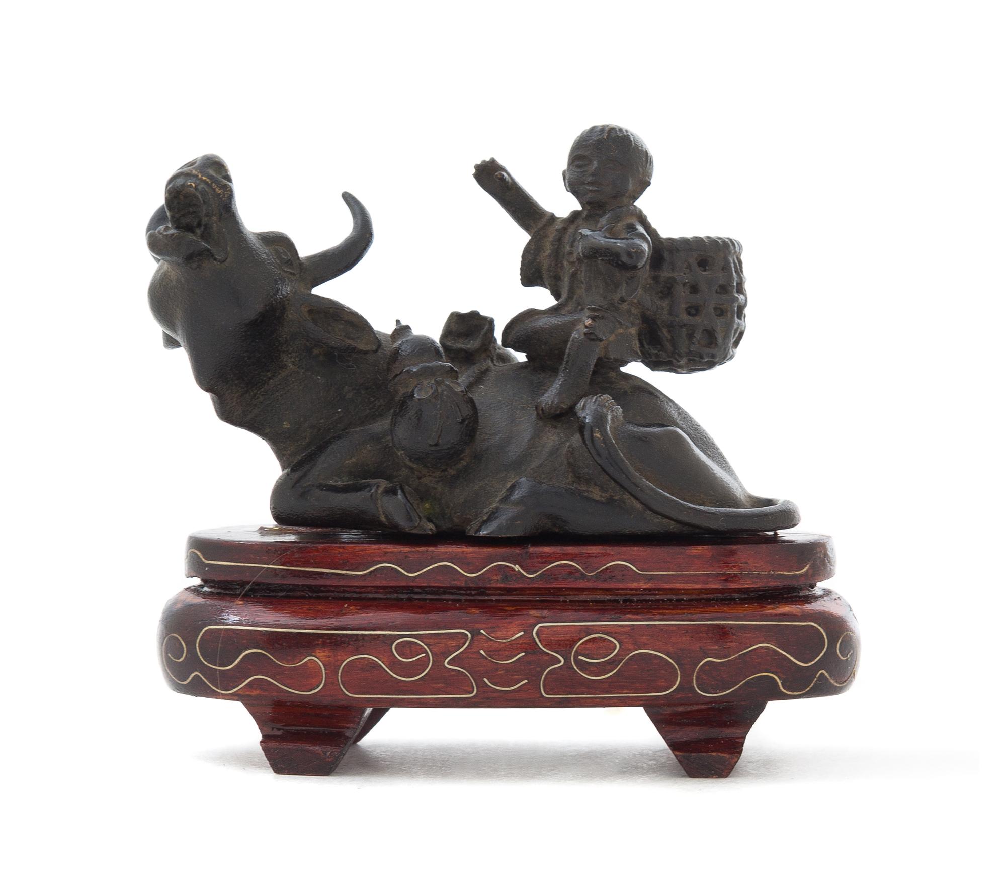 A Japanese Bronze Figural Water Dropper Length 3 1/2 inches.