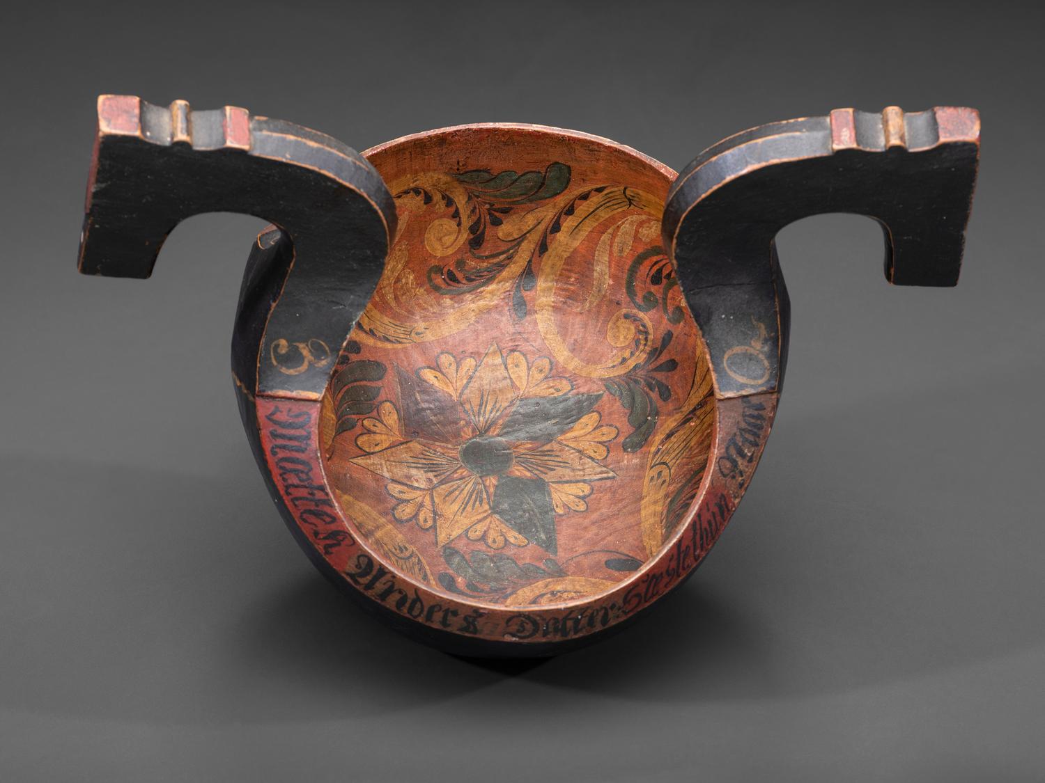 A Scandinavian Carved and Painted Wood Ale Bowl