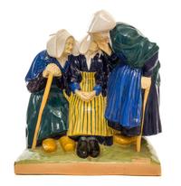 An Quimper Pottery Figural Group Height 14 5/8 inches.