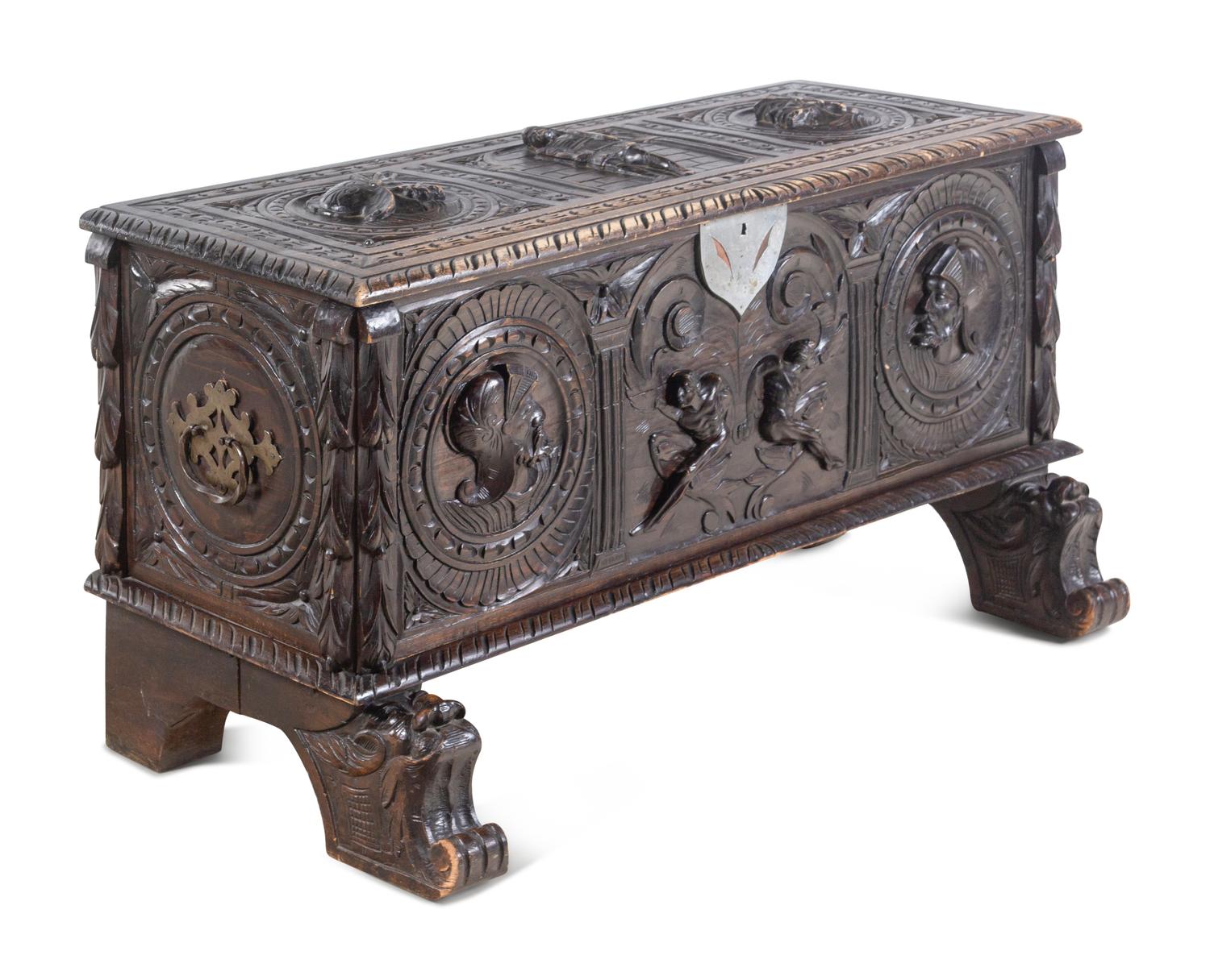 A Renaissance Revival Carved Walnut Chest