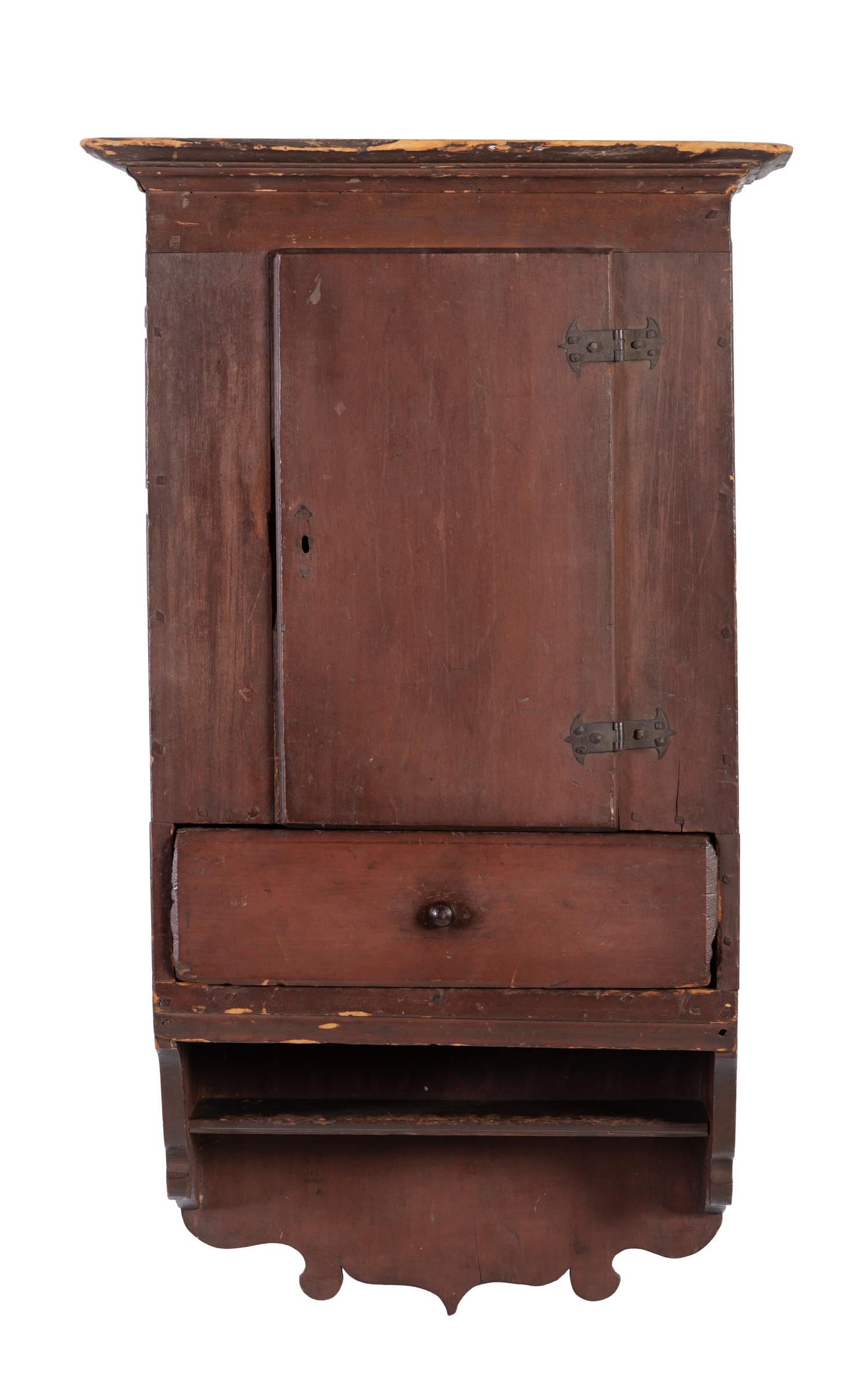 A Country Red-Stained and Carved Cherrywood Hanging Wall Cupboard