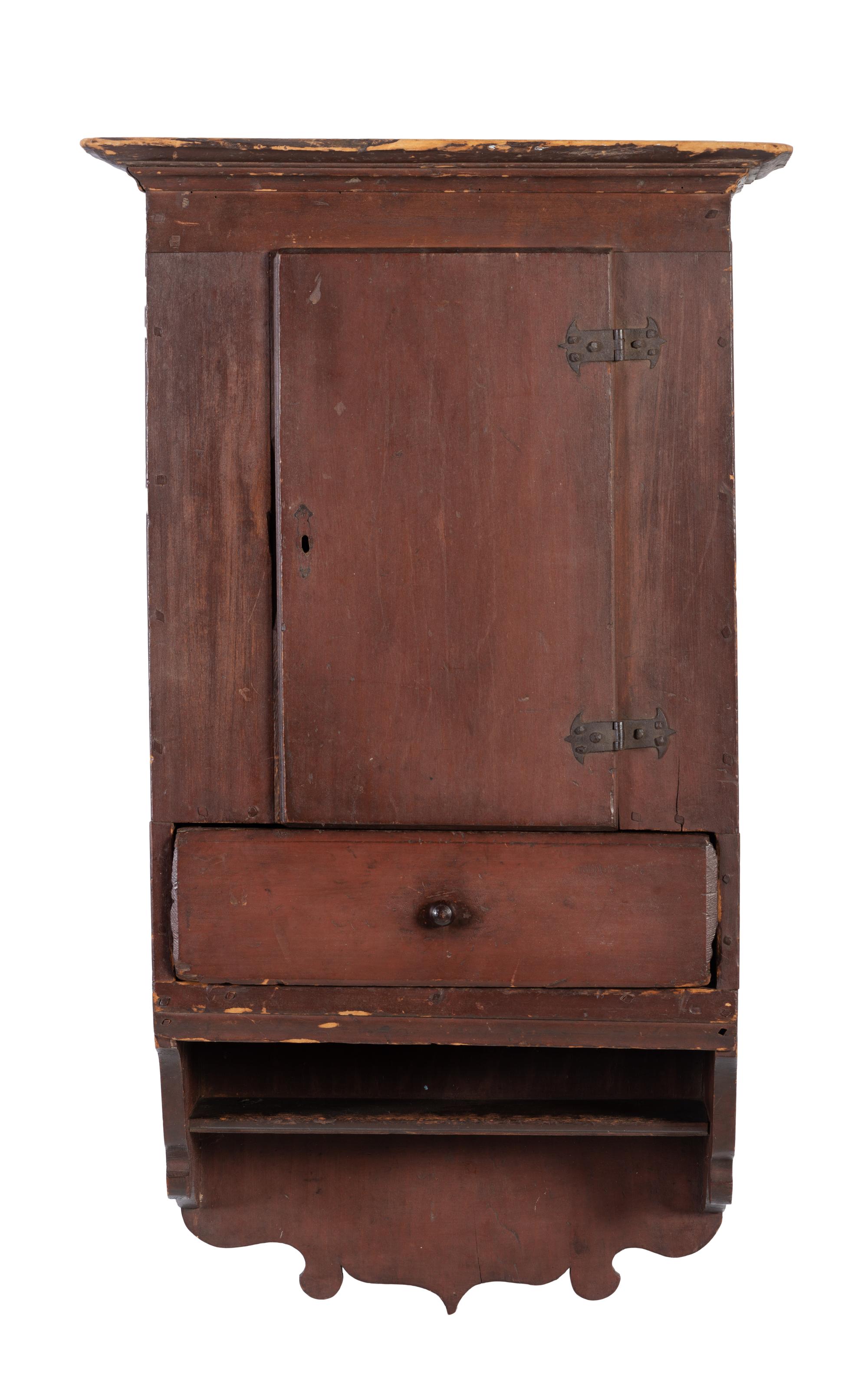 A Country Red-Stained and Carved Cherrywood Hanging Wall Cupboard