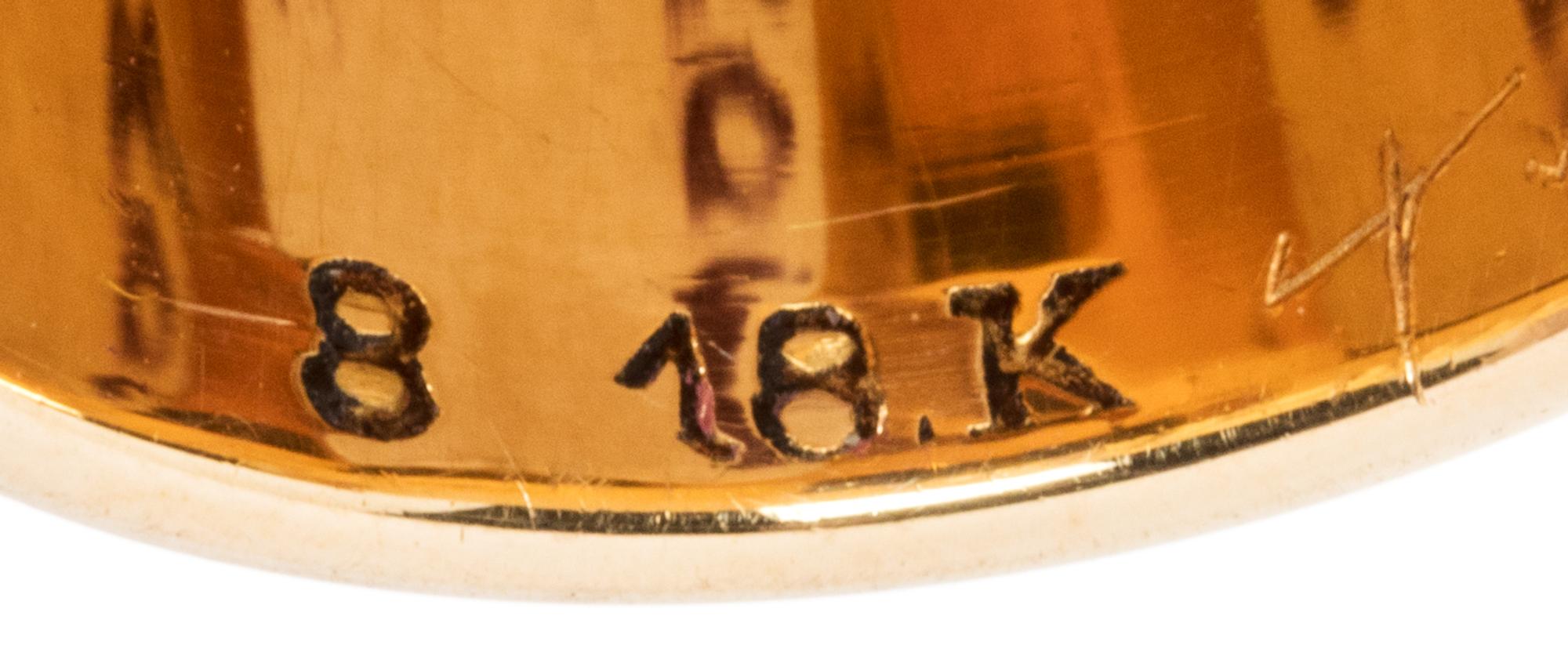 An American 18-Karat Yellow Gold and Enamel Thimble, Tiffany & Co., New York, NY, the knurled top and body above a polychrome enamel fl