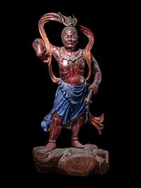 A Chinese Painted Wood Figure of a Guardian