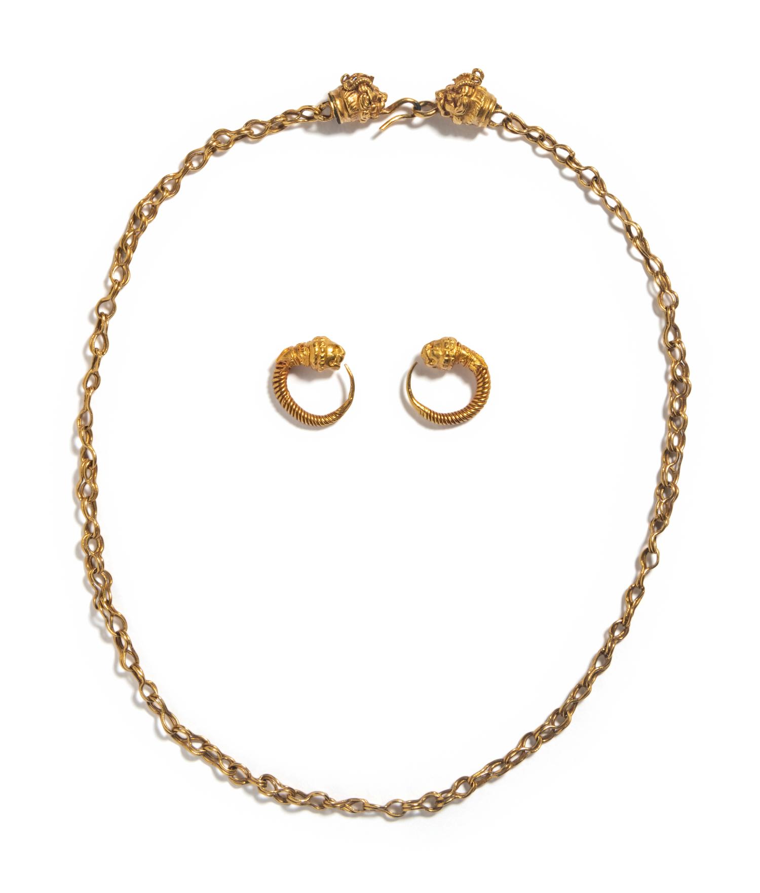 A Hellenistic Gold Necklace with a Pair of Hoop Earrings each with Lion-Head Terminals