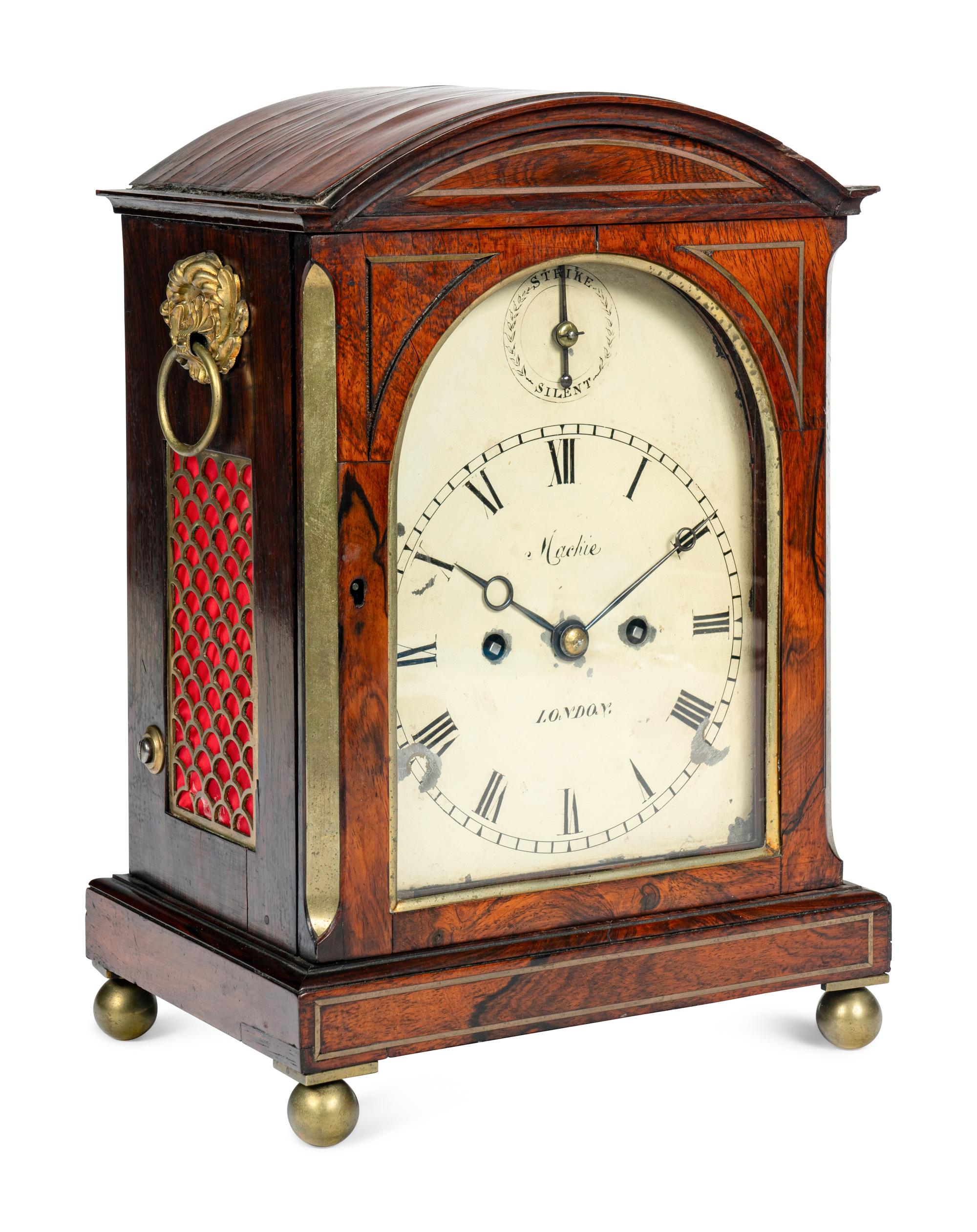 A Regency Rosewood and Brass-Inlaid Mantel Clock
