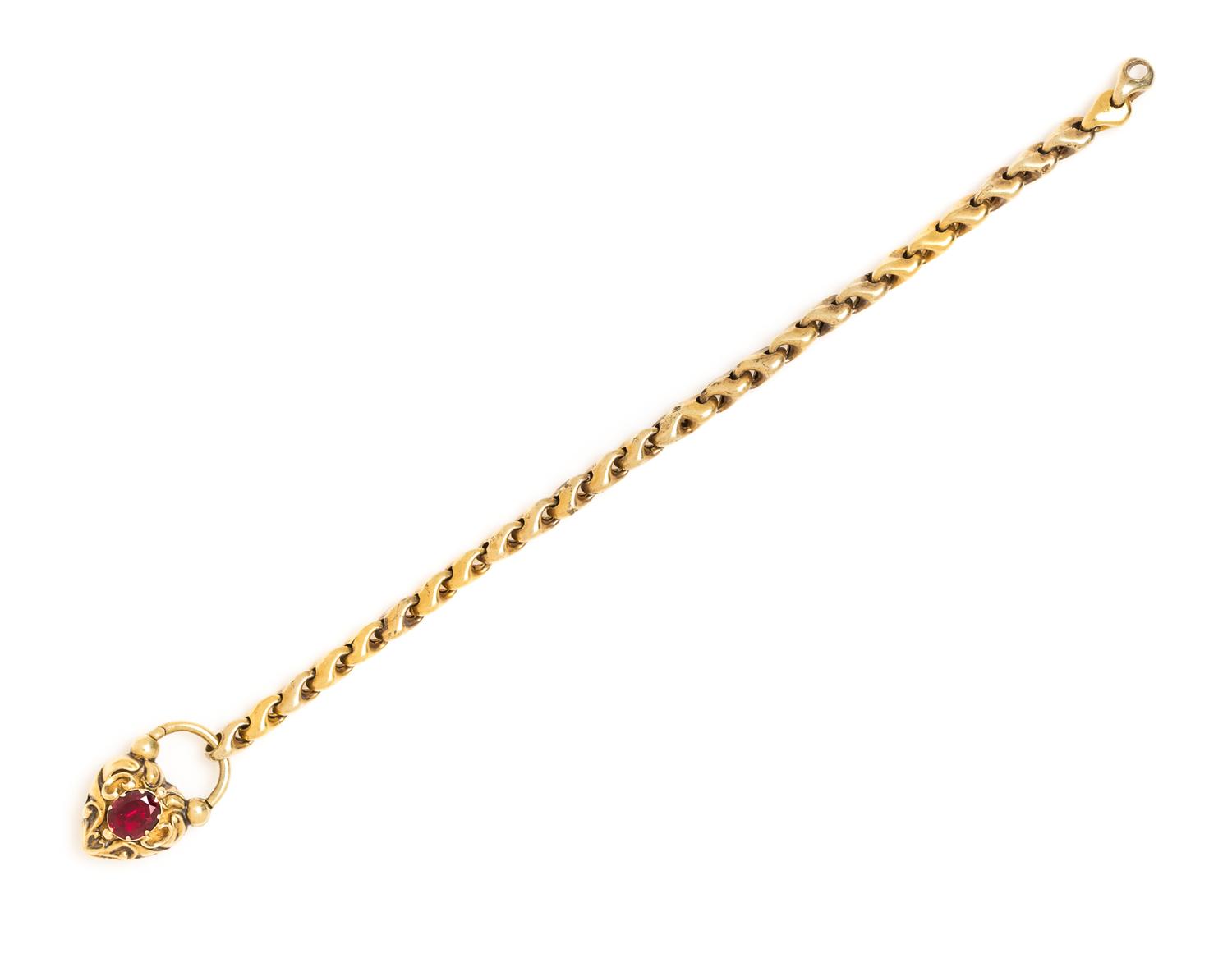 A Georgian Yellow Gold and Garnet Lover's Eye Padlock Charm Bracelet, 6.70 dwts.