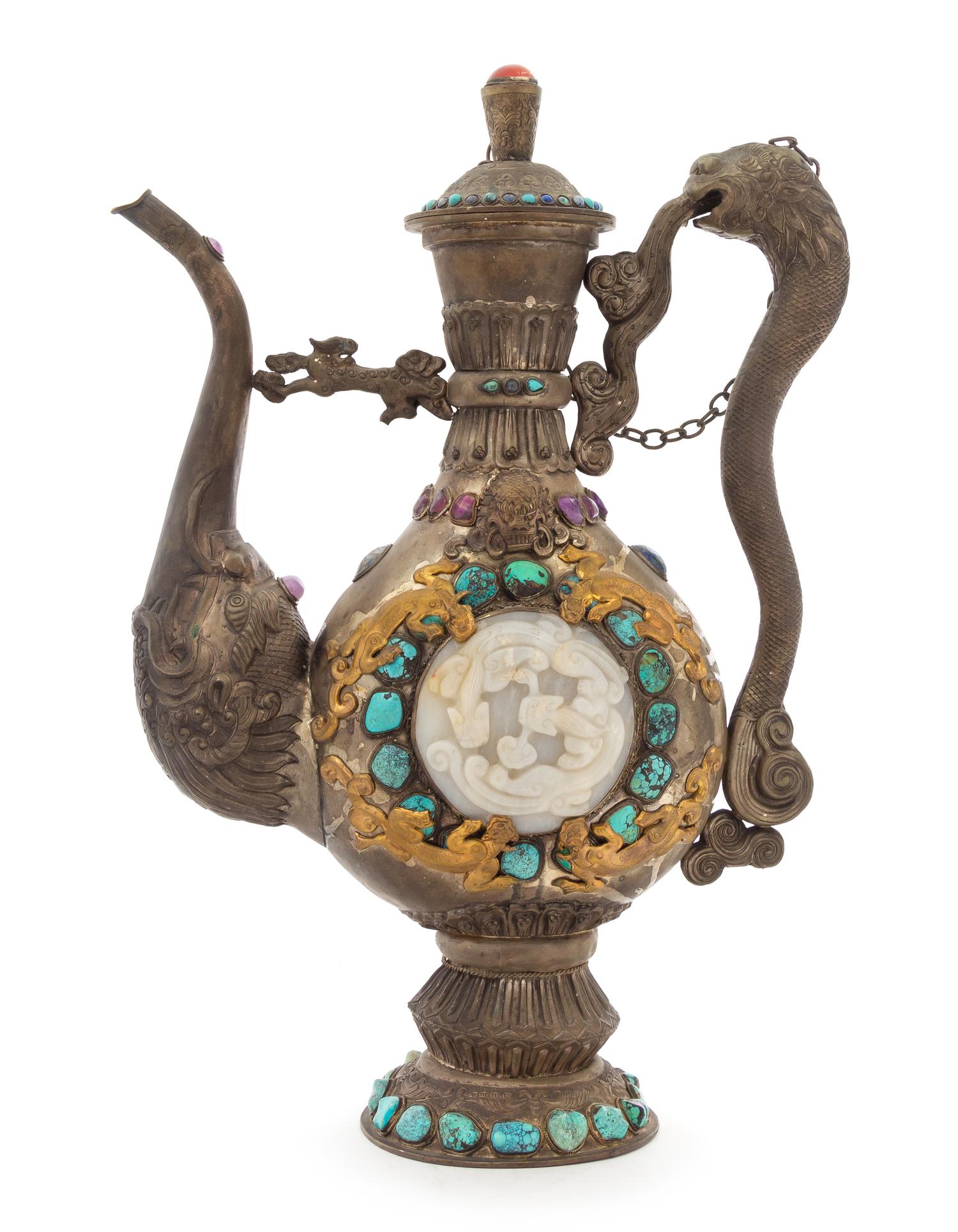 A Large Tibetan Jade and Hardstone Inset Silver Teapot Height 20 inches.
