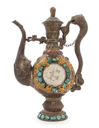 A Large Tibetan Jade and Hardstone Inset Silver Teapot Height 20 inches.