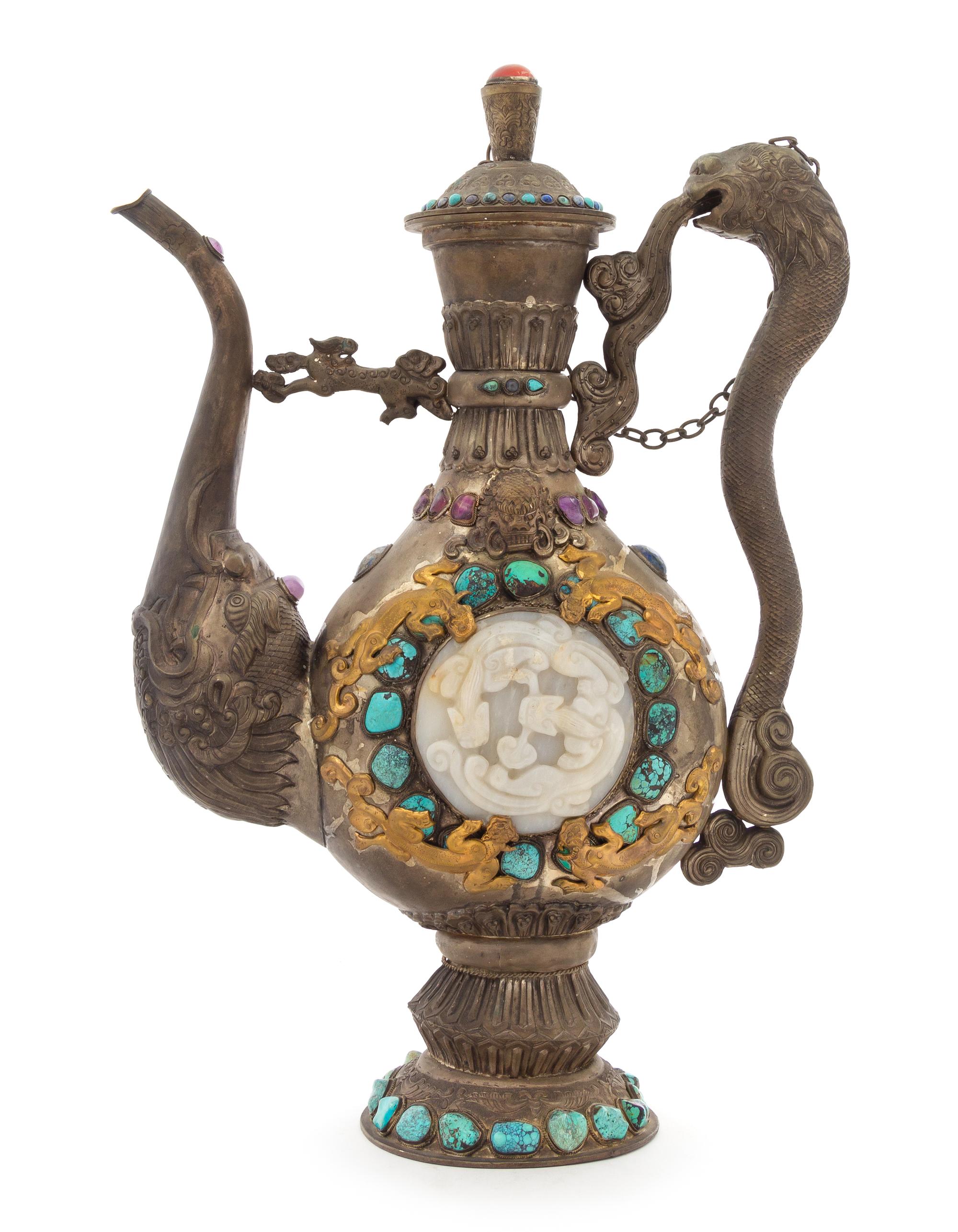 A Large Tibetan Jade and Hardstone Inset Silver Teapot Height 20 inches.