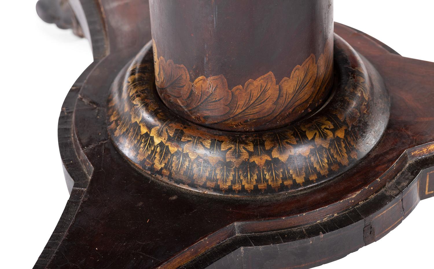 A Classical Parcel Gilt, Stencil Decorated, Carved and Inlaid Mahogany Tilt-Top Claw-Foot Breakfast Table