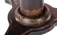 A Classical Parcel Gilt, Stencil Decorated, Carved and Inlaid Mahogany Tilt-Top Claw-Foot Breakfast Table