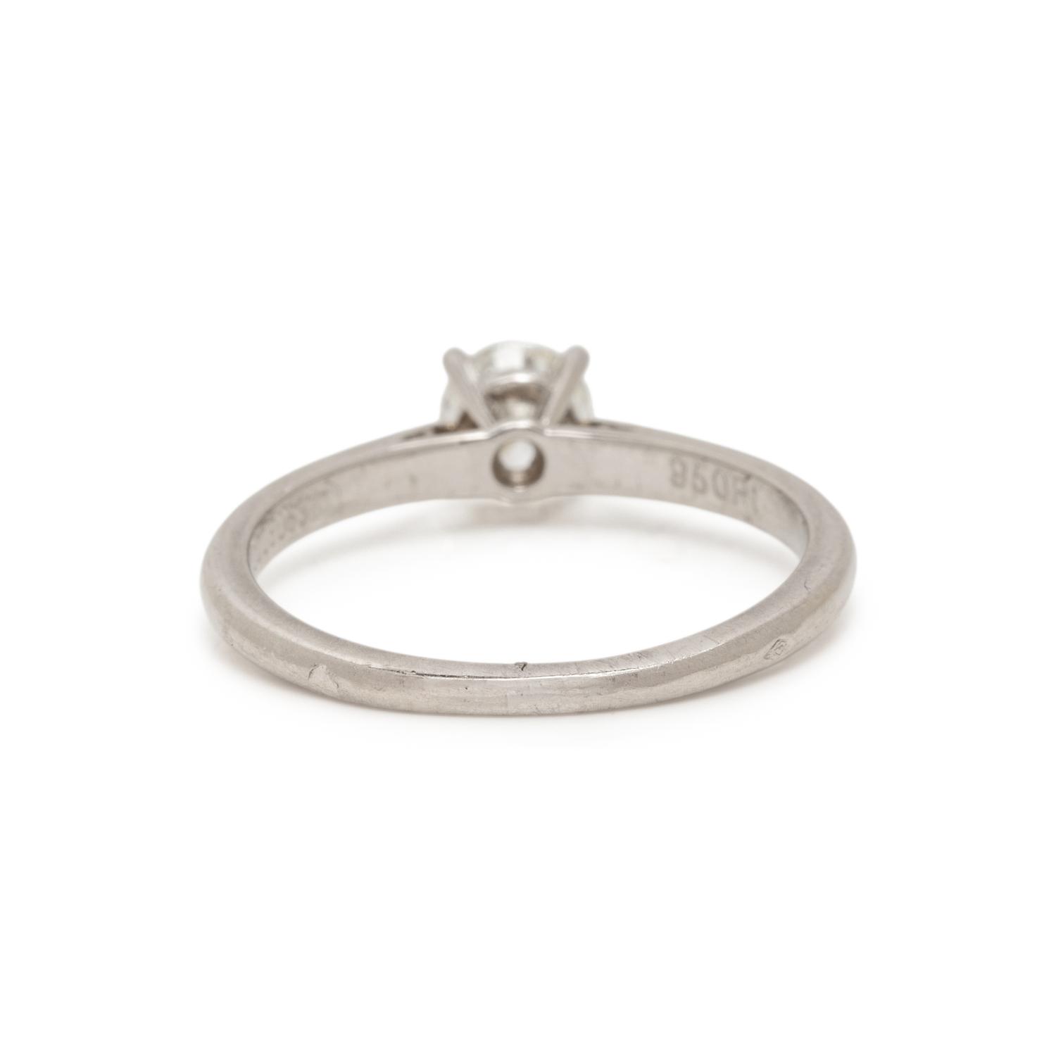 CARTIER, PLATINUM AND DIAMOND RING