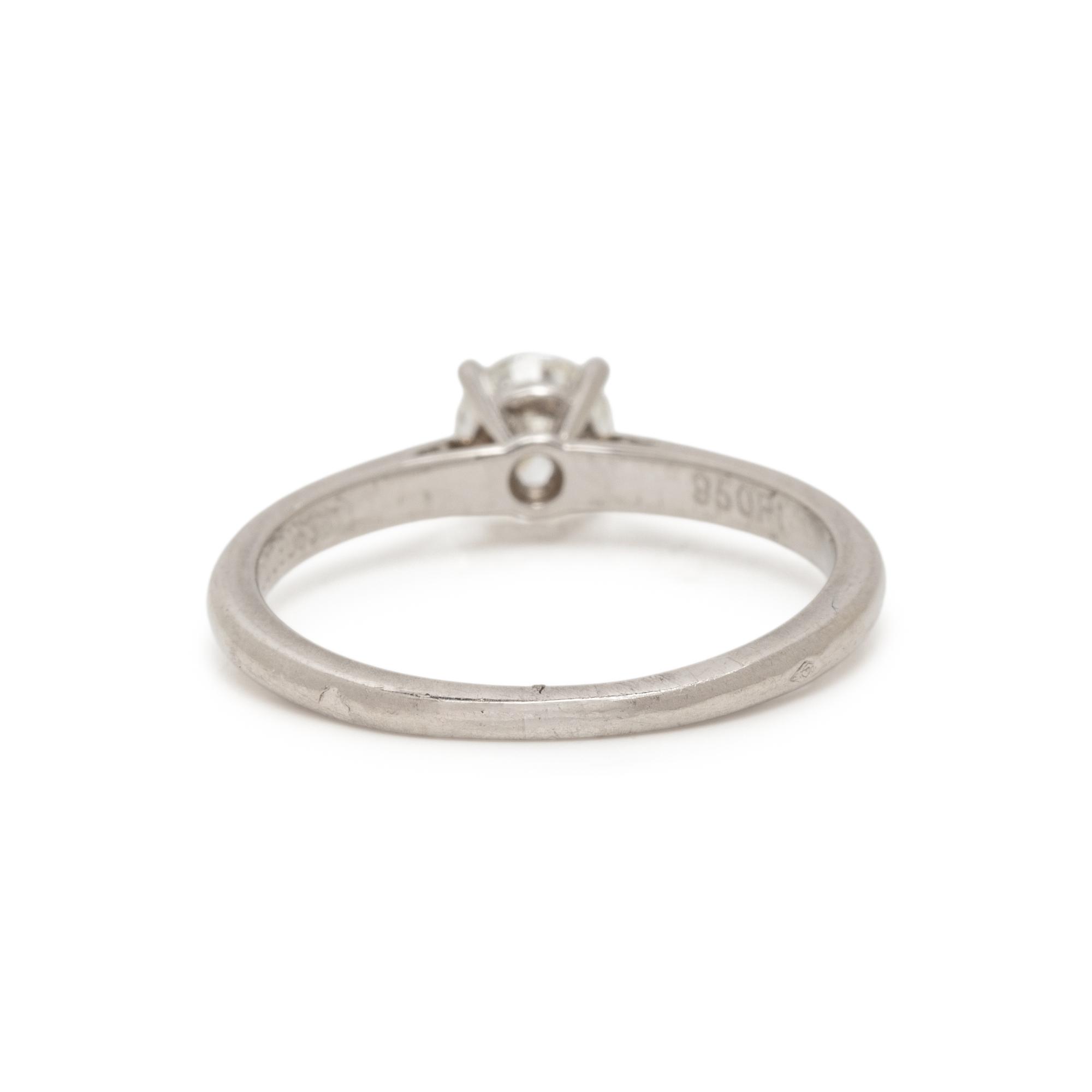 CARTIER, PLATINUM AND DIAMOND RING