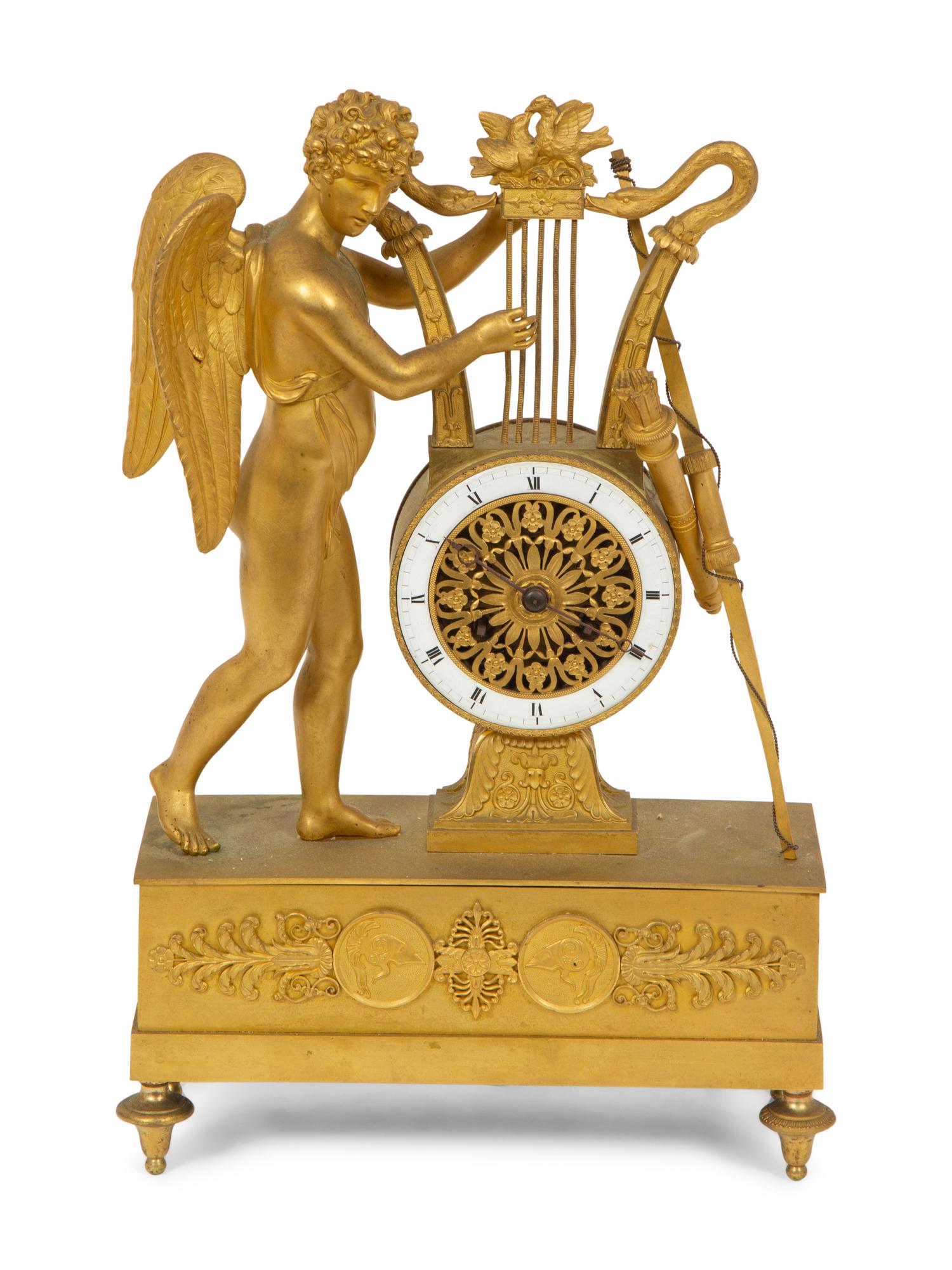 An Empire Gilt Bronze Figural Mantel Clock