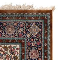 An Indian or Qom Silk Rug
