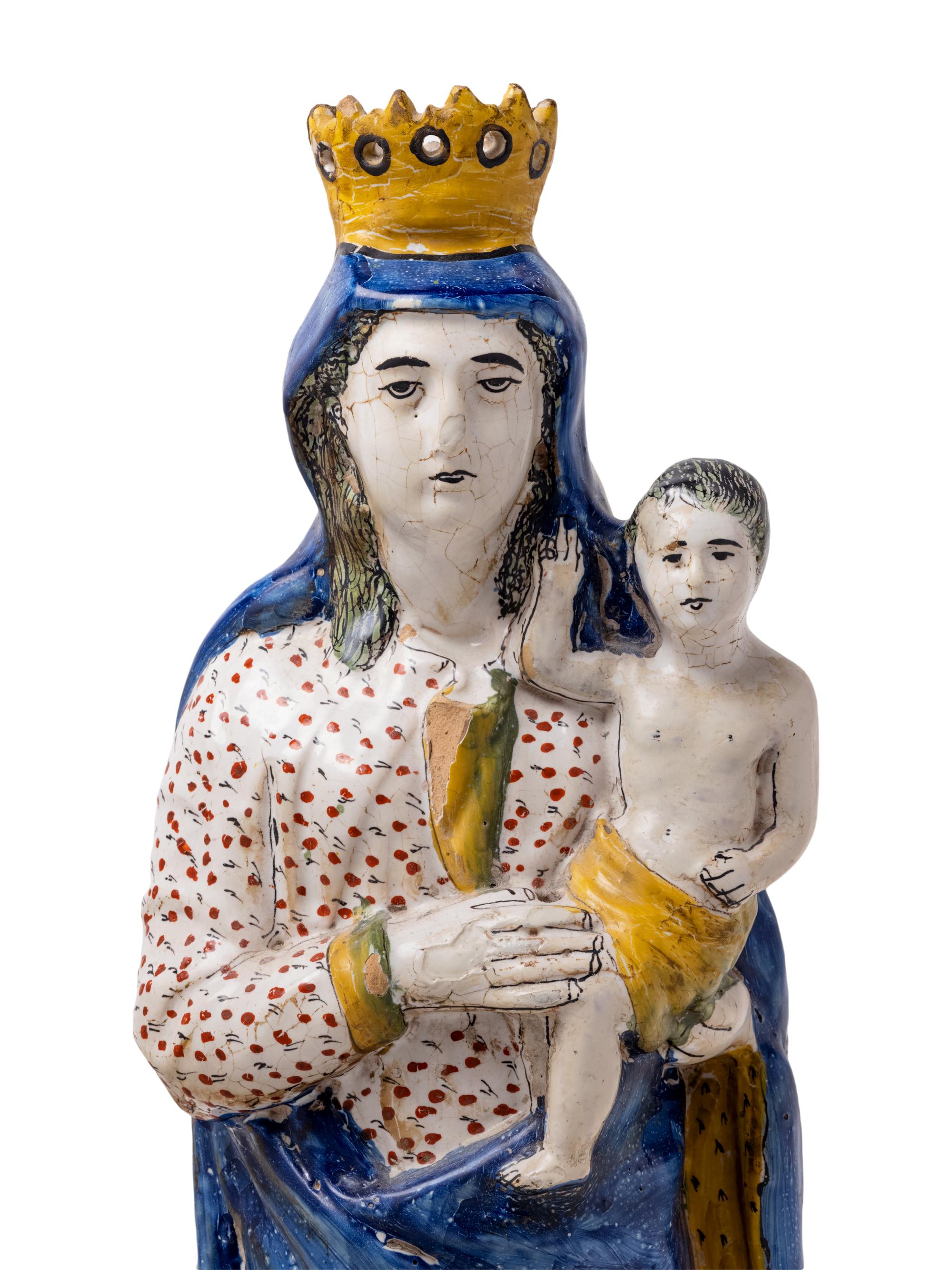 An Italian Faïence Figure of the Madonna and Child