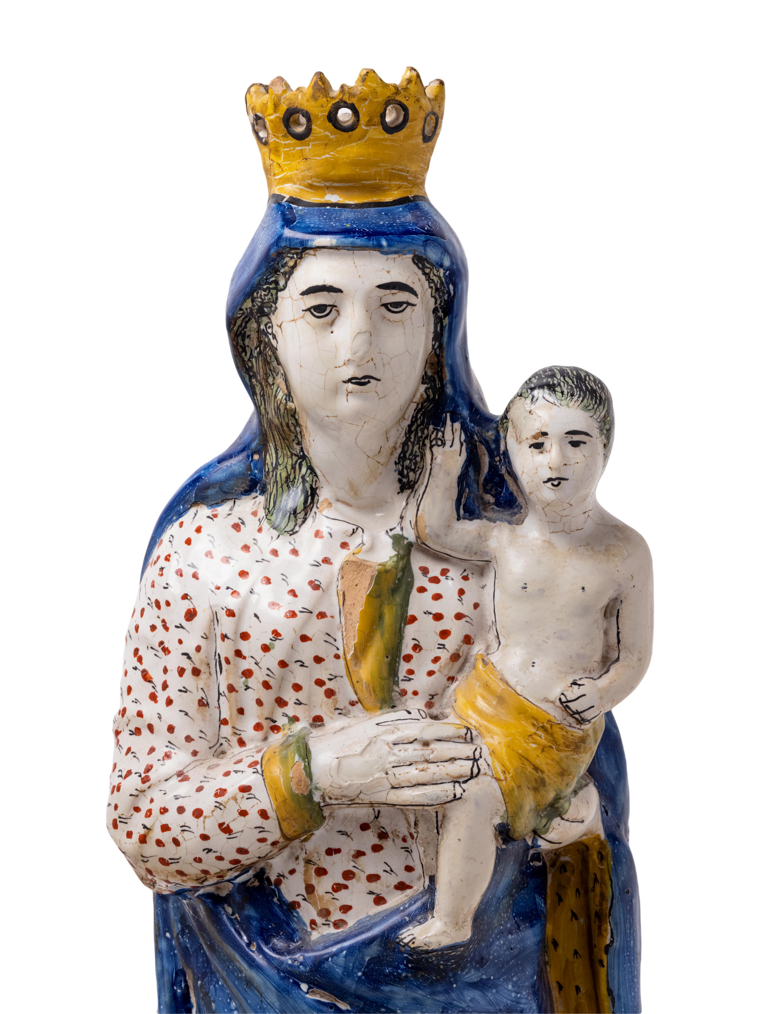 An Italian Faïence Figure of the Madonna and Child