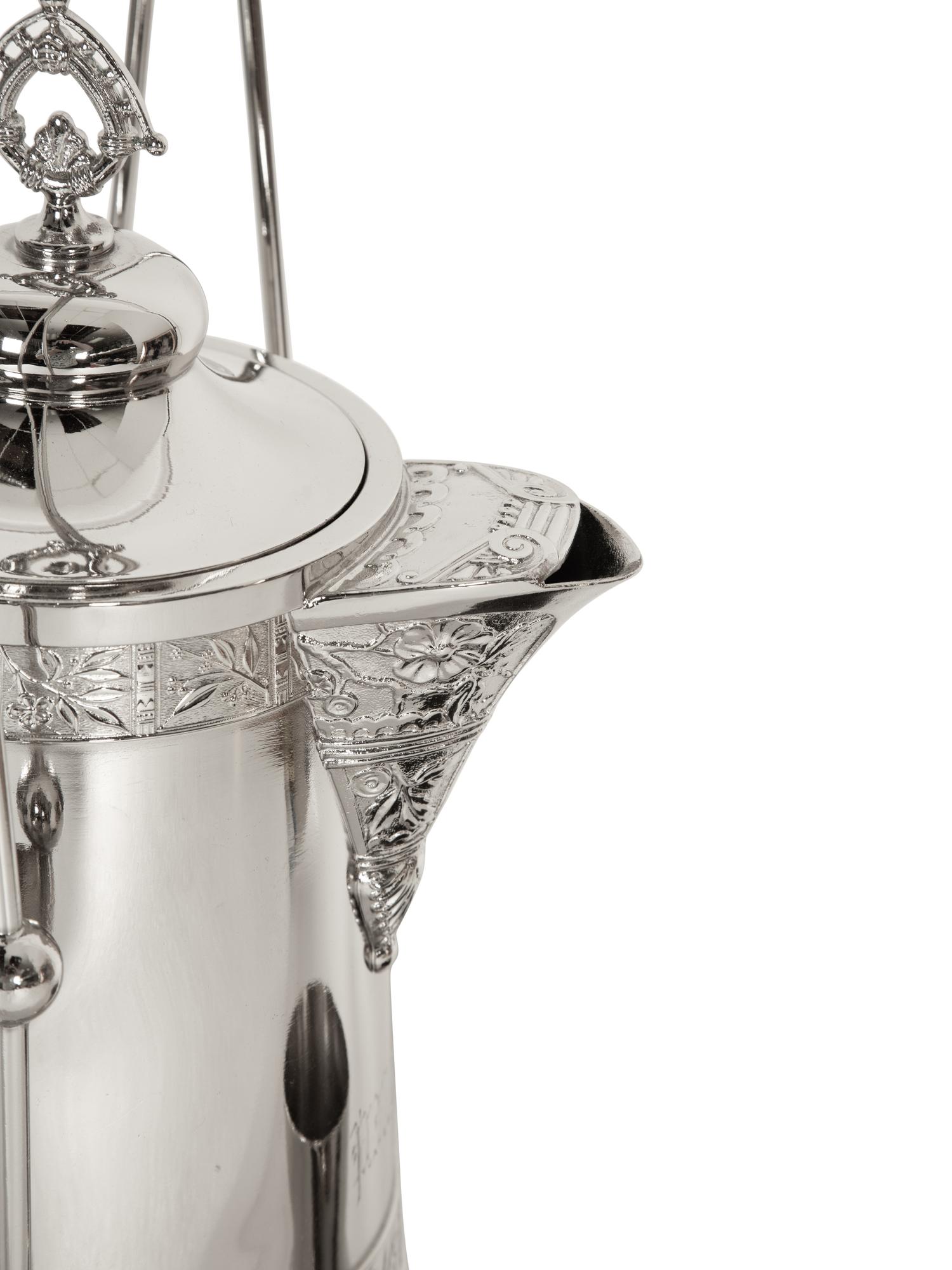 A Victorian Style Silver-Plated Tilting Pitcher and Goblet on Stand