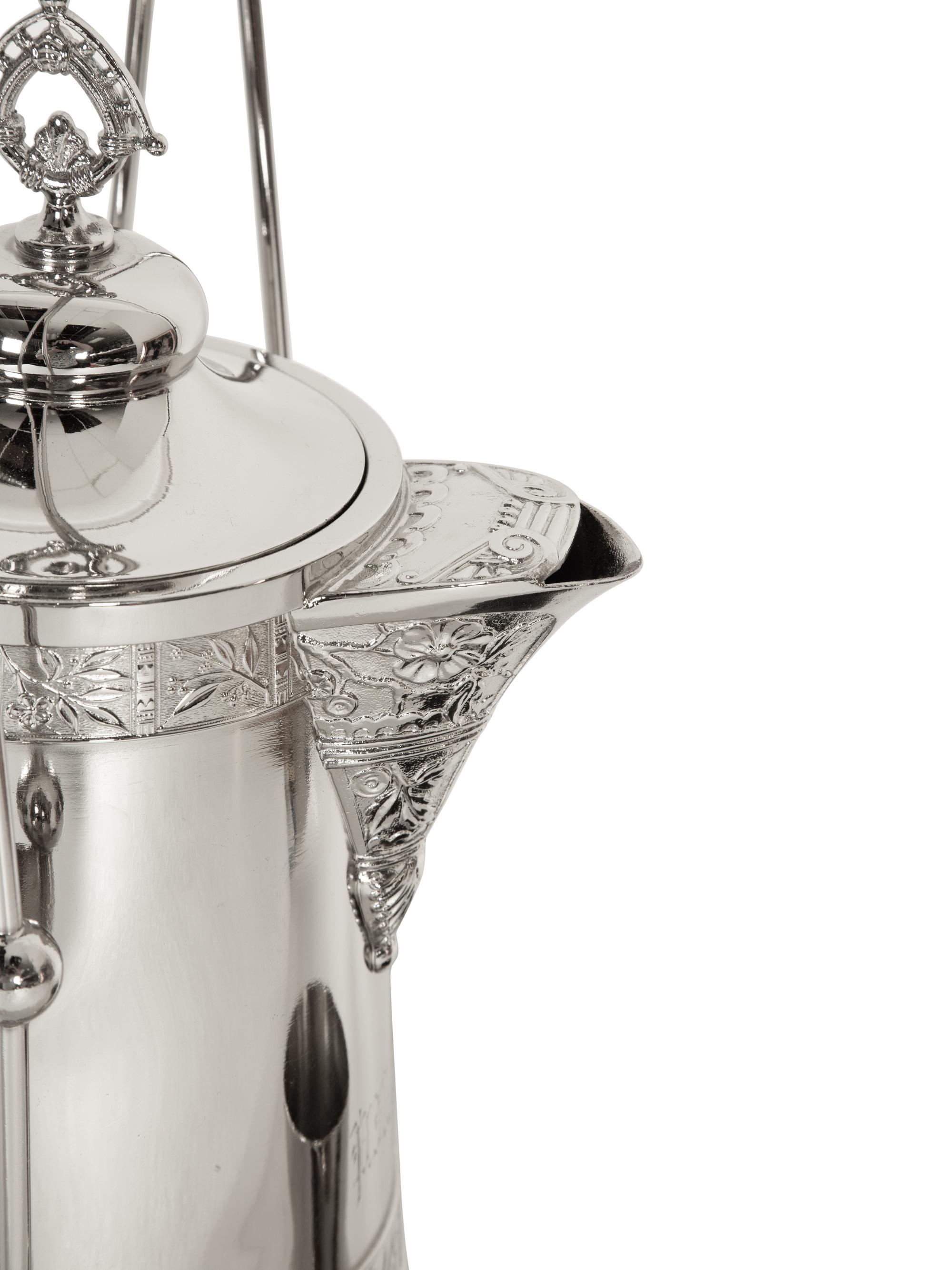 A Victorian Style Silver-Plated Tilting Pitcher and Goblet on Stand