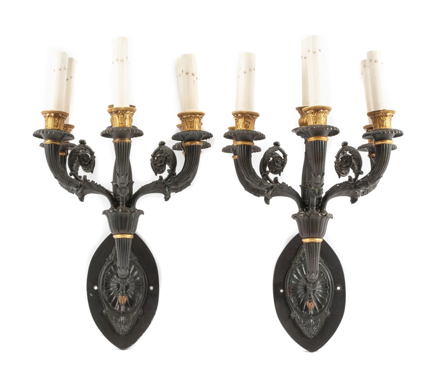 A Pair of Empire Style Gilt and Patinated Bronze Six-Light Sconces Height 21 inches. — 19TH CENTURY