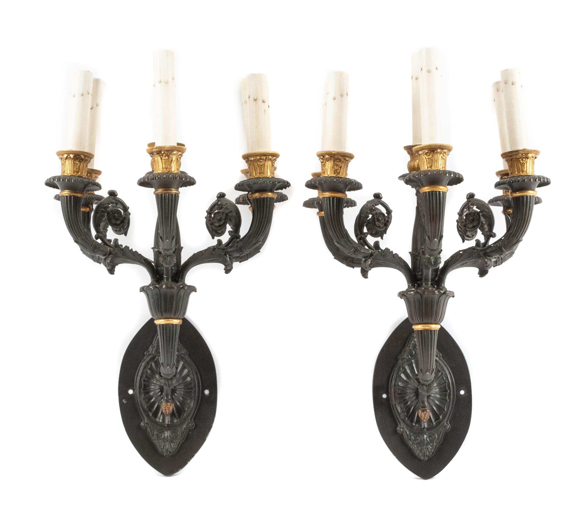 A Pair of Empire Style Gilt and Patinated Bronze Six-Light Sconces Height 21 inches. — 19TH CENTURY