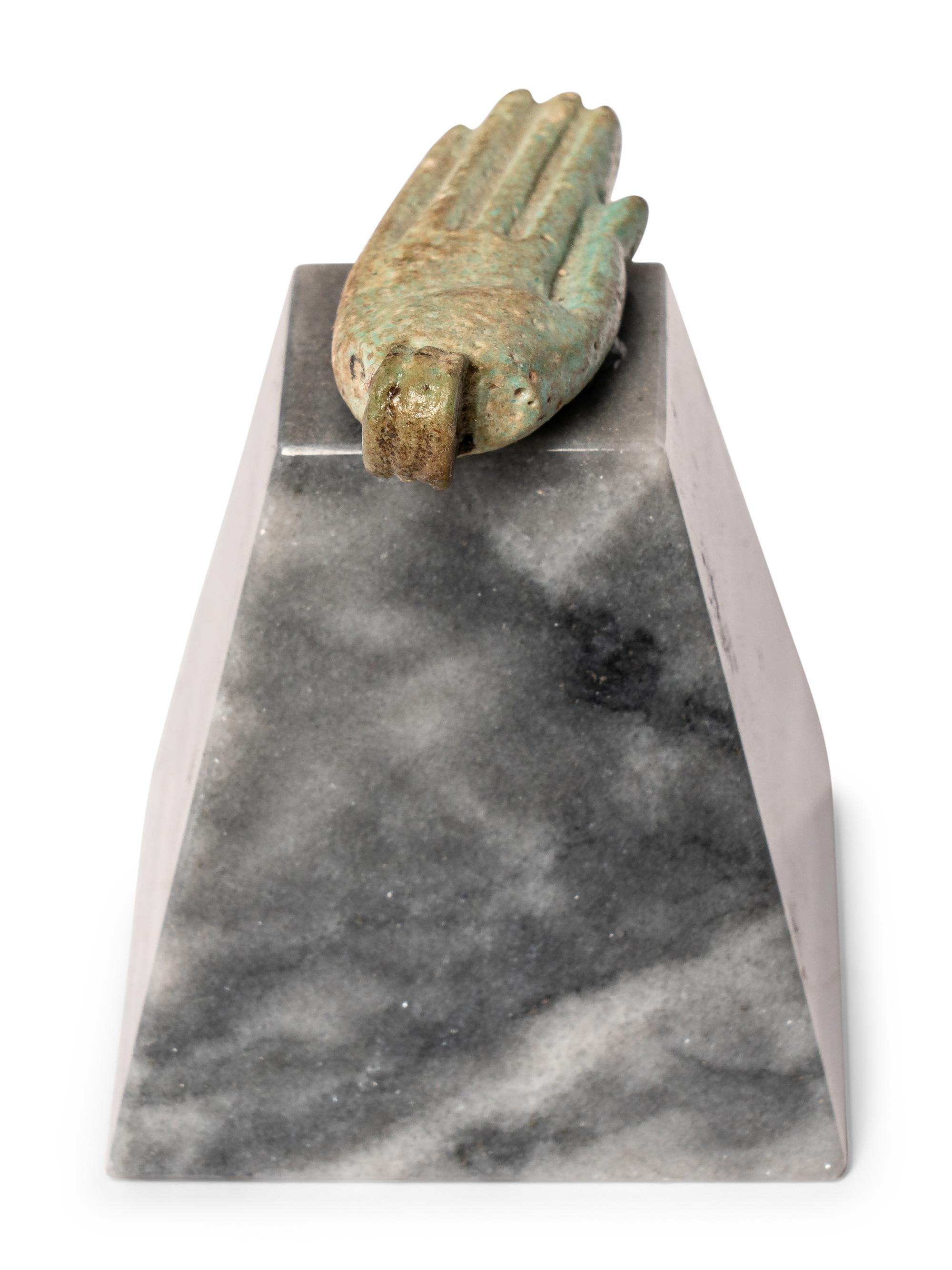 An Egyptian Faience Hand