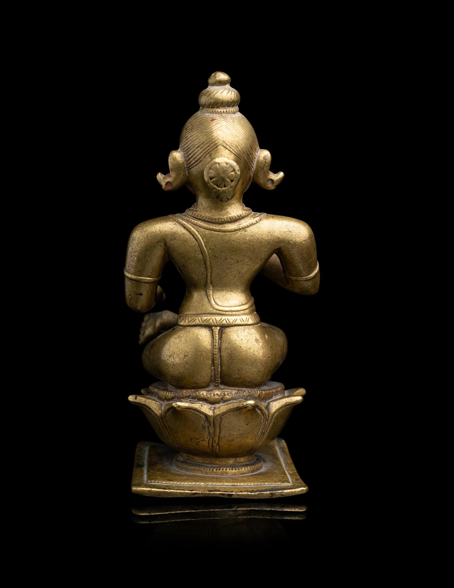 An Indian Orissa Bronze Figure of Seated Vishnu