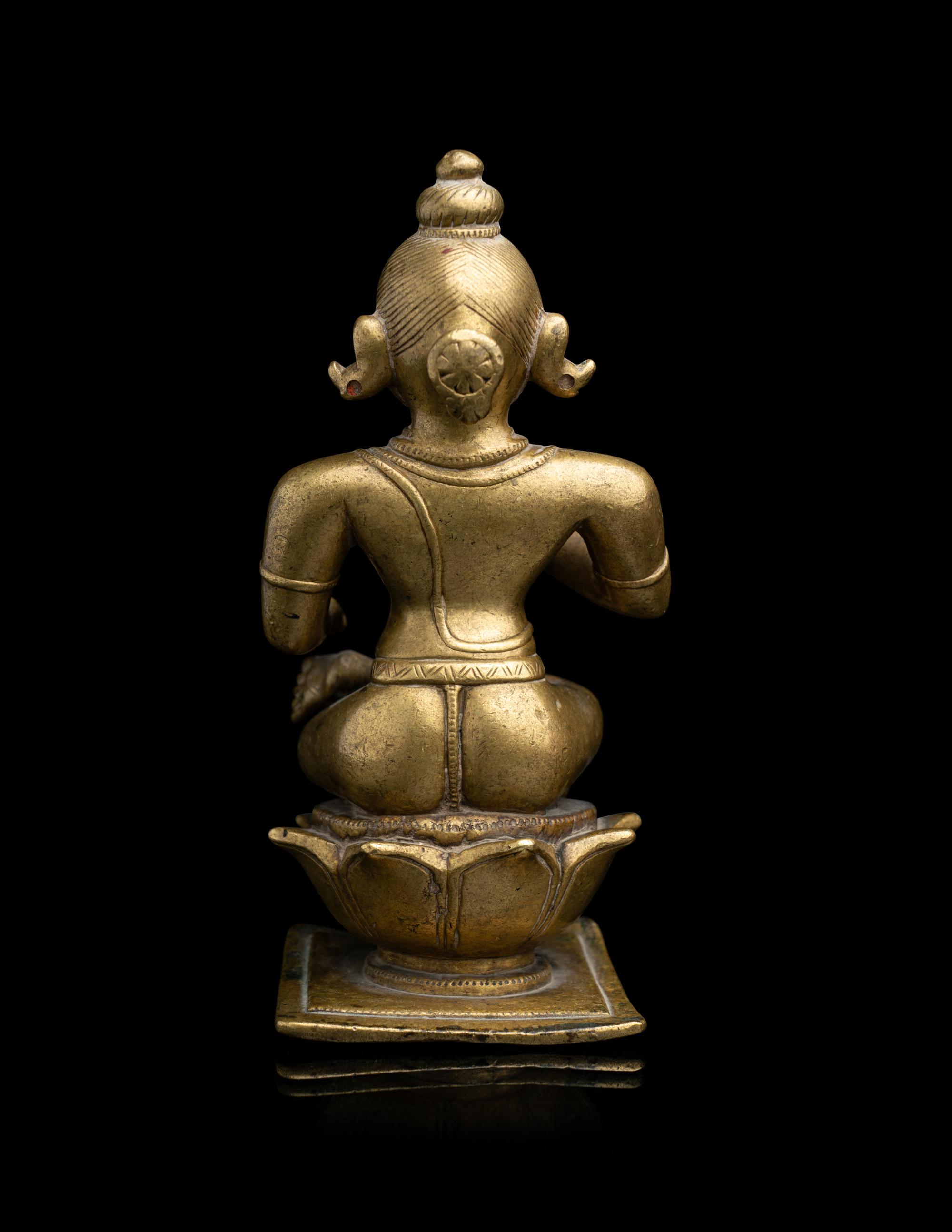 An Indian Orissa Bronze Figure of Seated Vishnu